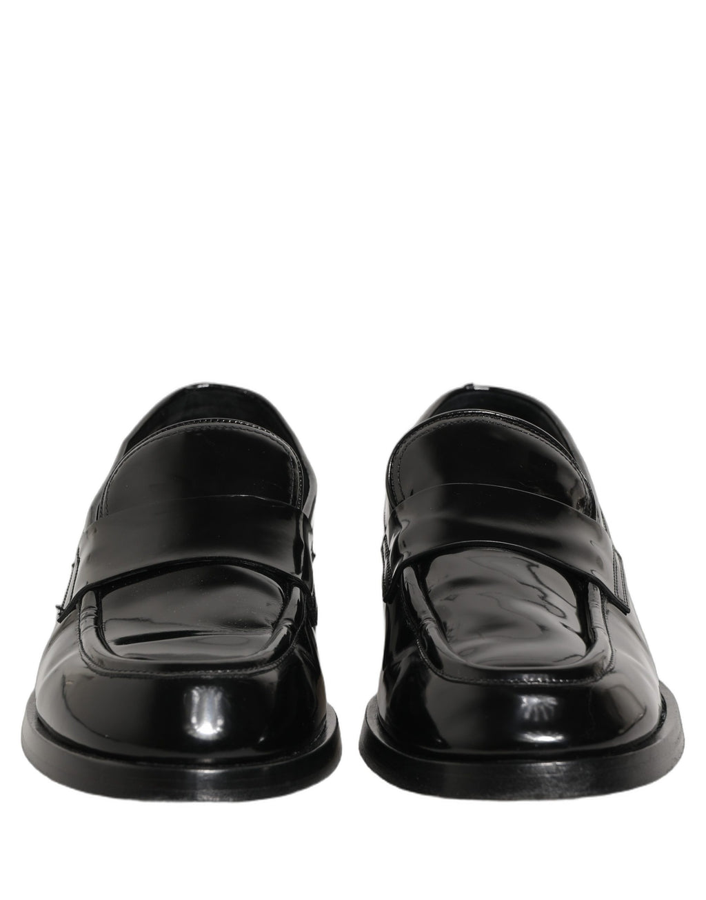 Chaussures hommes Dolce & Gabbana en cuir noir, loafers formels élégants pour occasion spéciale ou bureau.