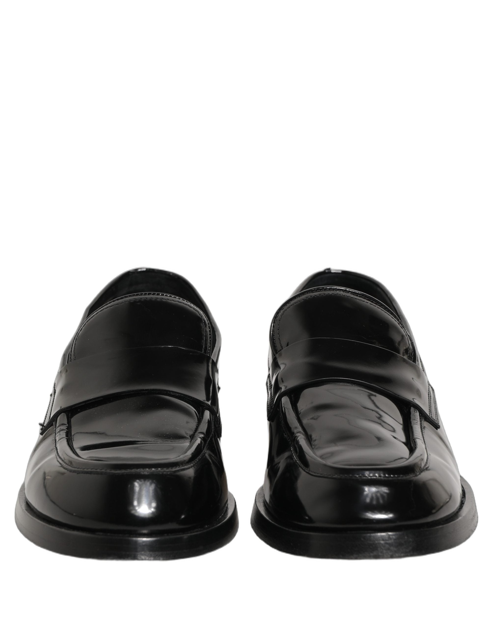 Chaussures hommes Dolce & Gabbana en cuir noir, loafers formels élégants pour occasion spéciale ou bureau.