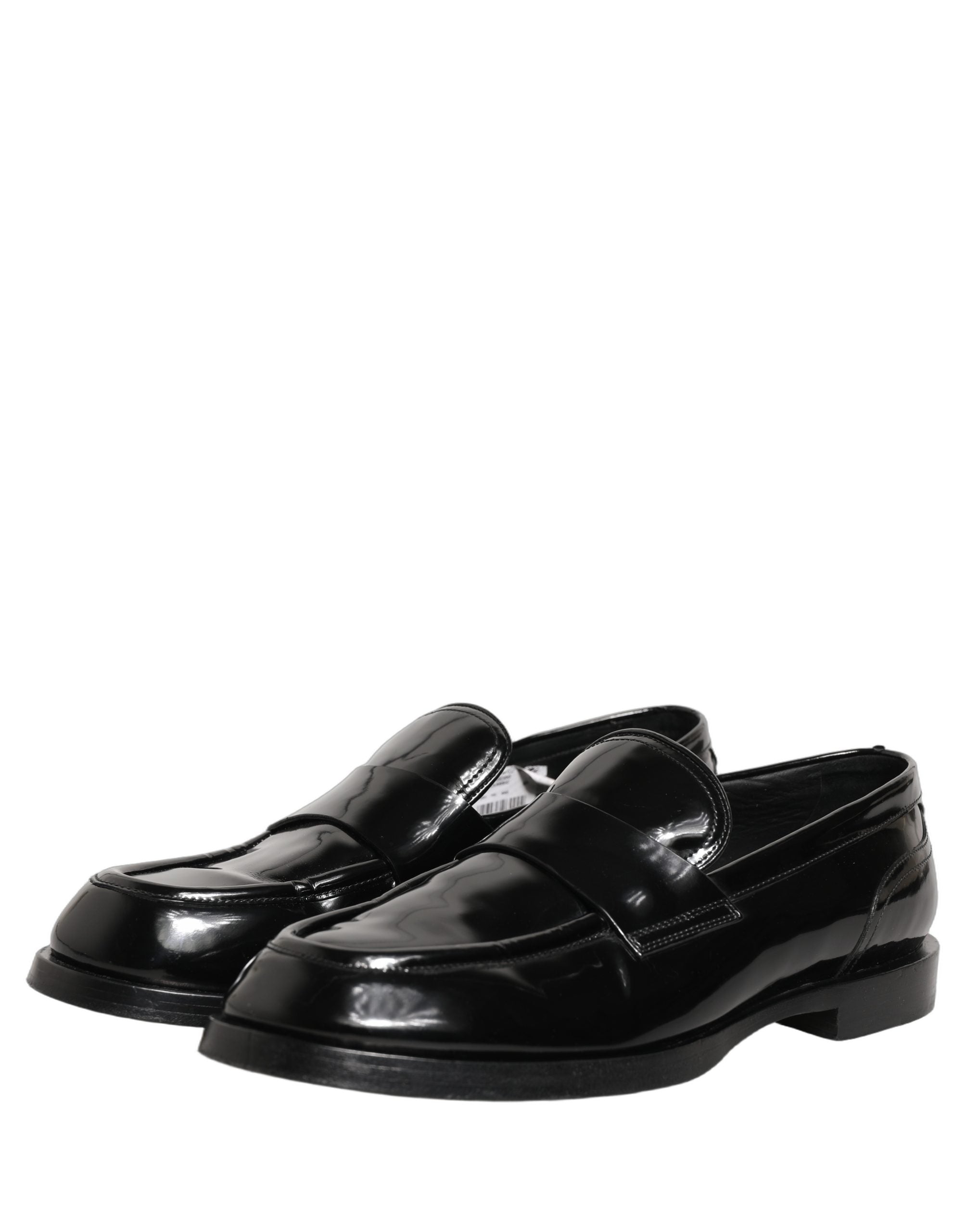 Chaussures mocassins formelles en cuir noir de Dolce & Gabbana pour homme, élégantes et sophistiquées.