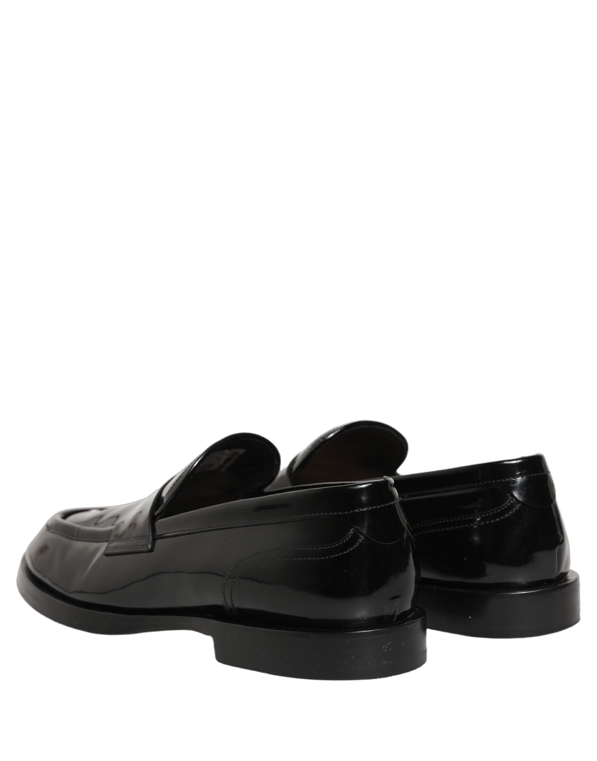 Chaussures Richelieu noires en cuir pour homme Dolce & Gabbana, élégantes mocassins formels en cuir noir.
