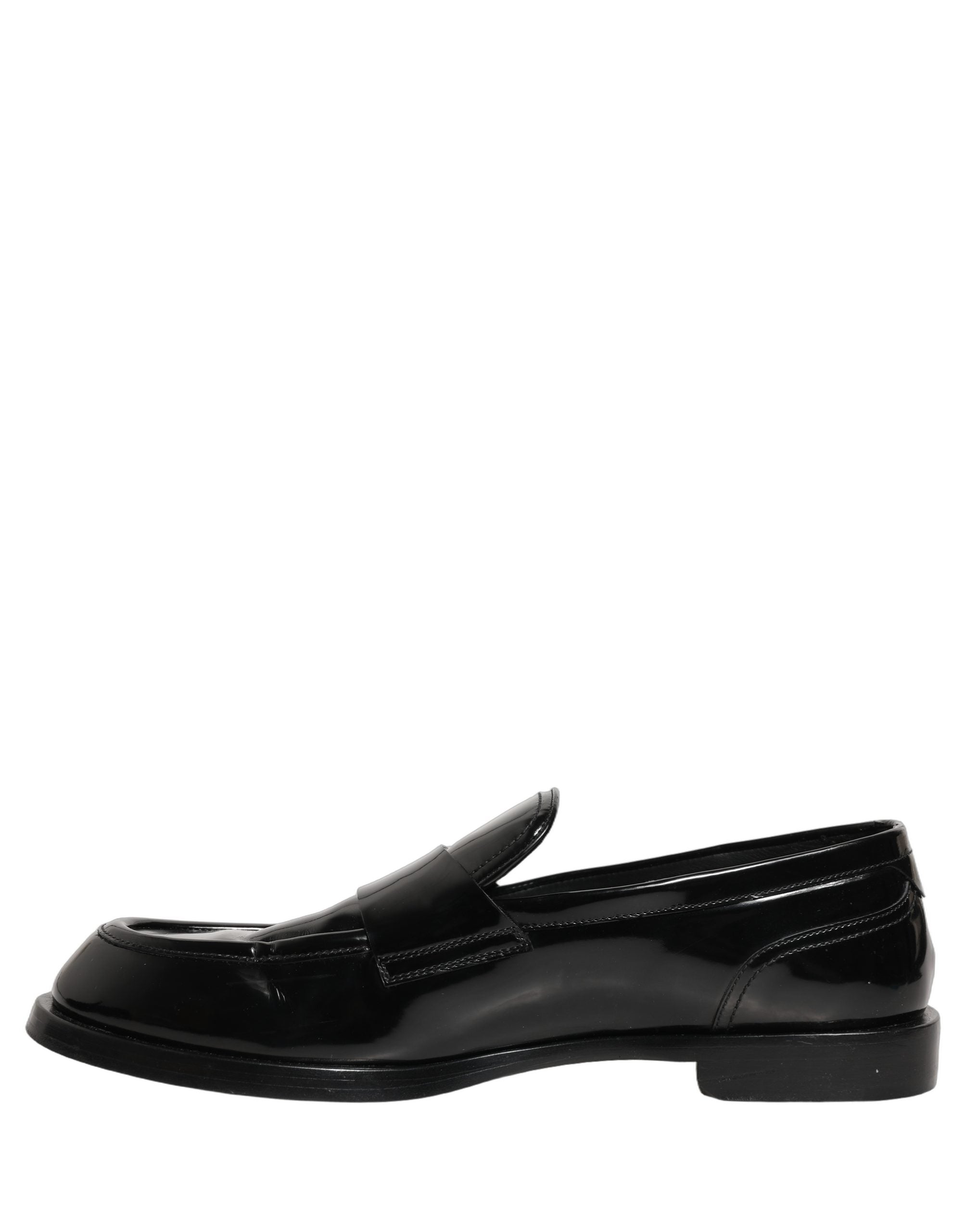 Chaussures hommes Dolce & Gabbana en cuir noir, mocassins habillés formels pour homme, élégance et style sophistiqué.