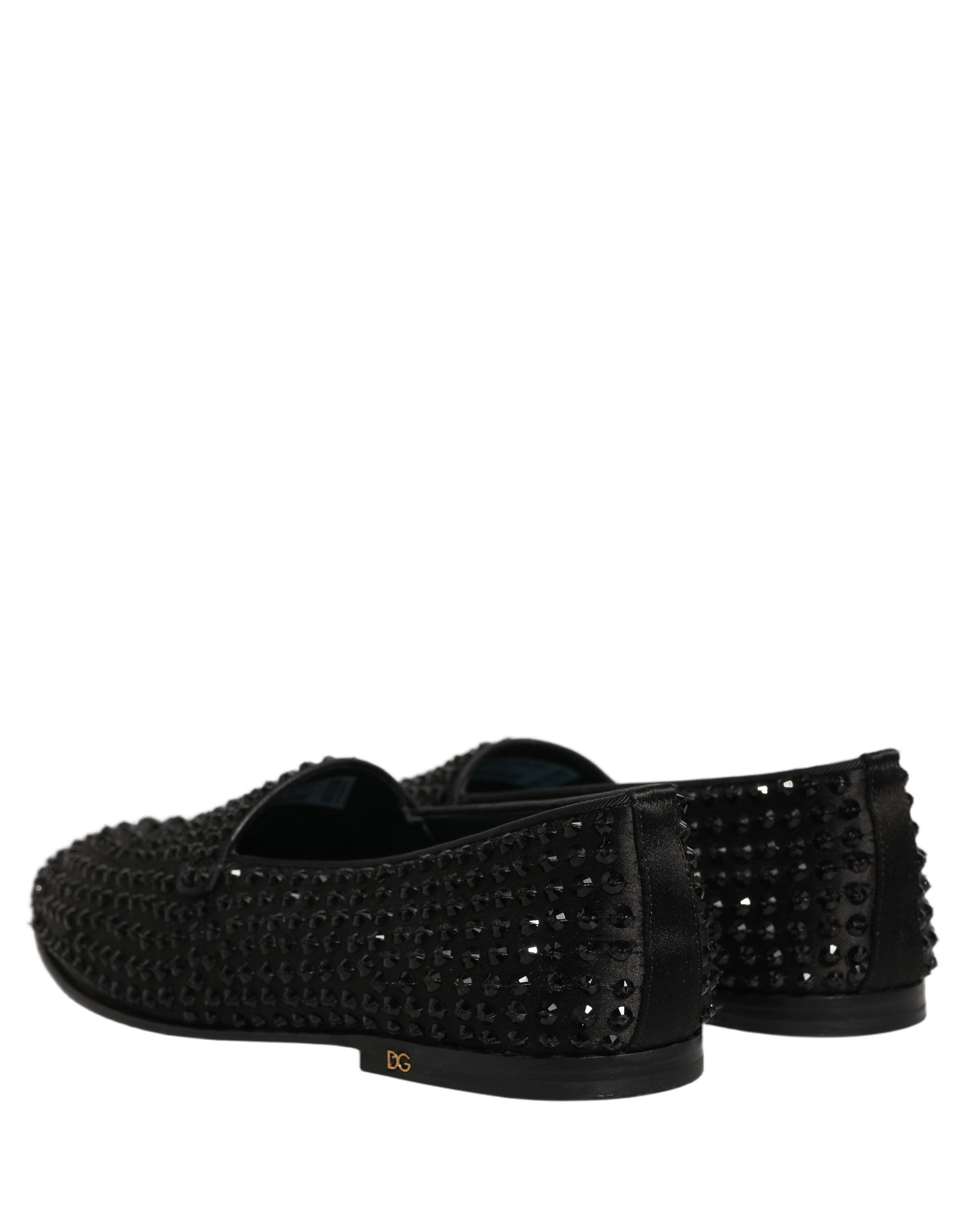 Chaussures loafers Dolce & Gabbana noires ornées de strass brillants et embellissements en rhinestones.