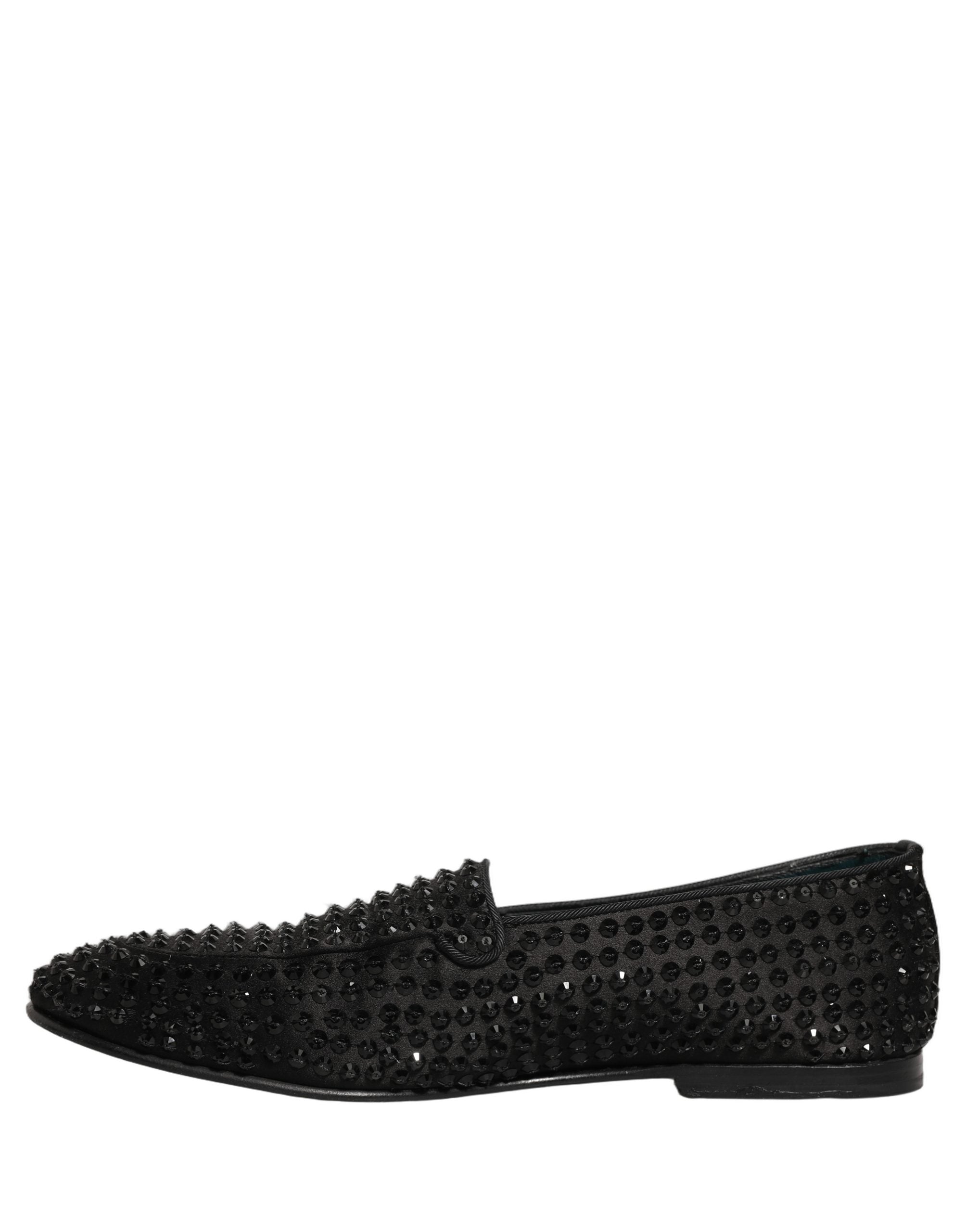 Chaussures loafers Dolce & Gabbana noires avec embellissements en strass brillants et détails en cuir, élégantes et sophistiquées.