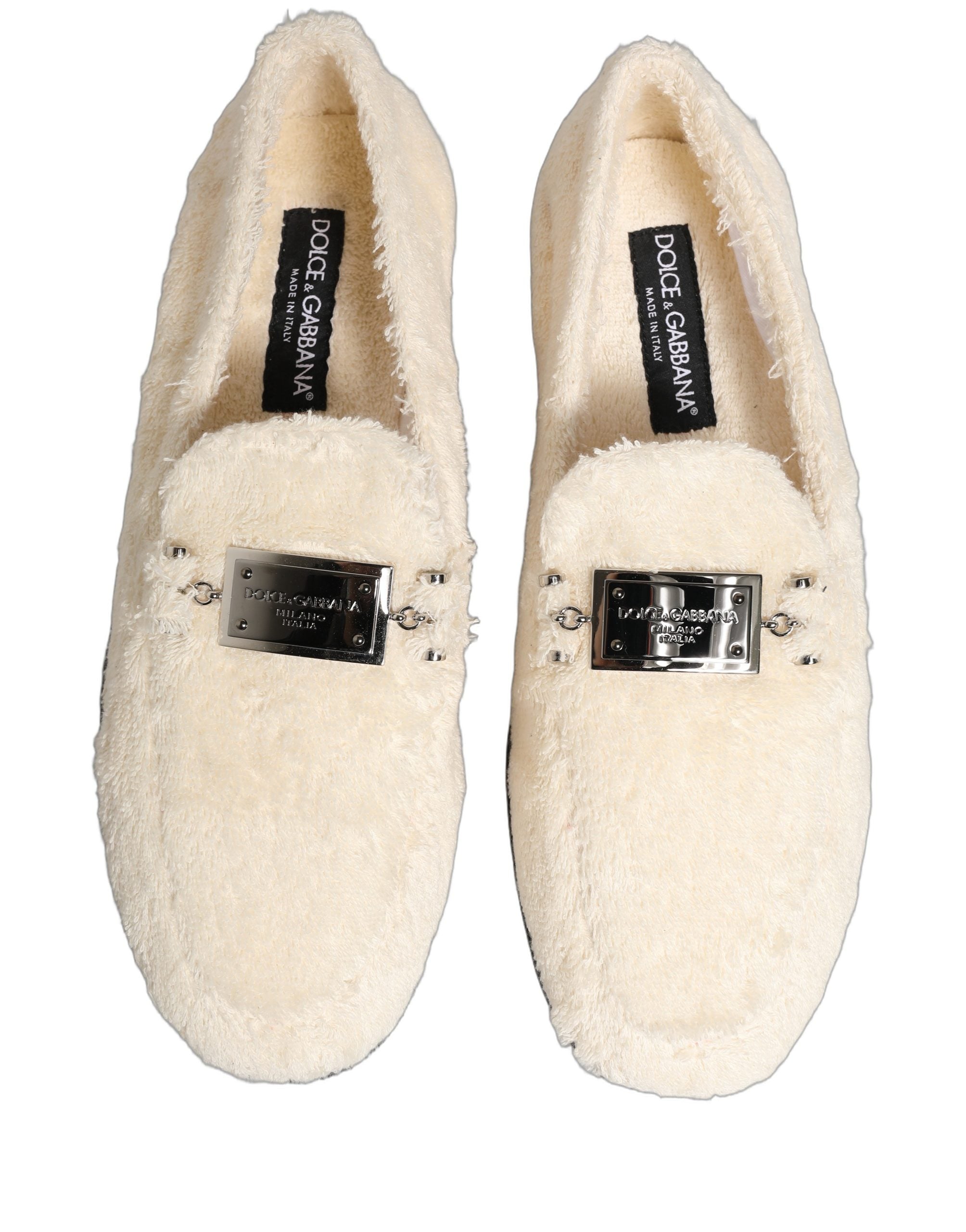 Chaussures mocassins pour homme Dolce & Gabbana en fourrure blanche et shearling, élégantes et confortables.