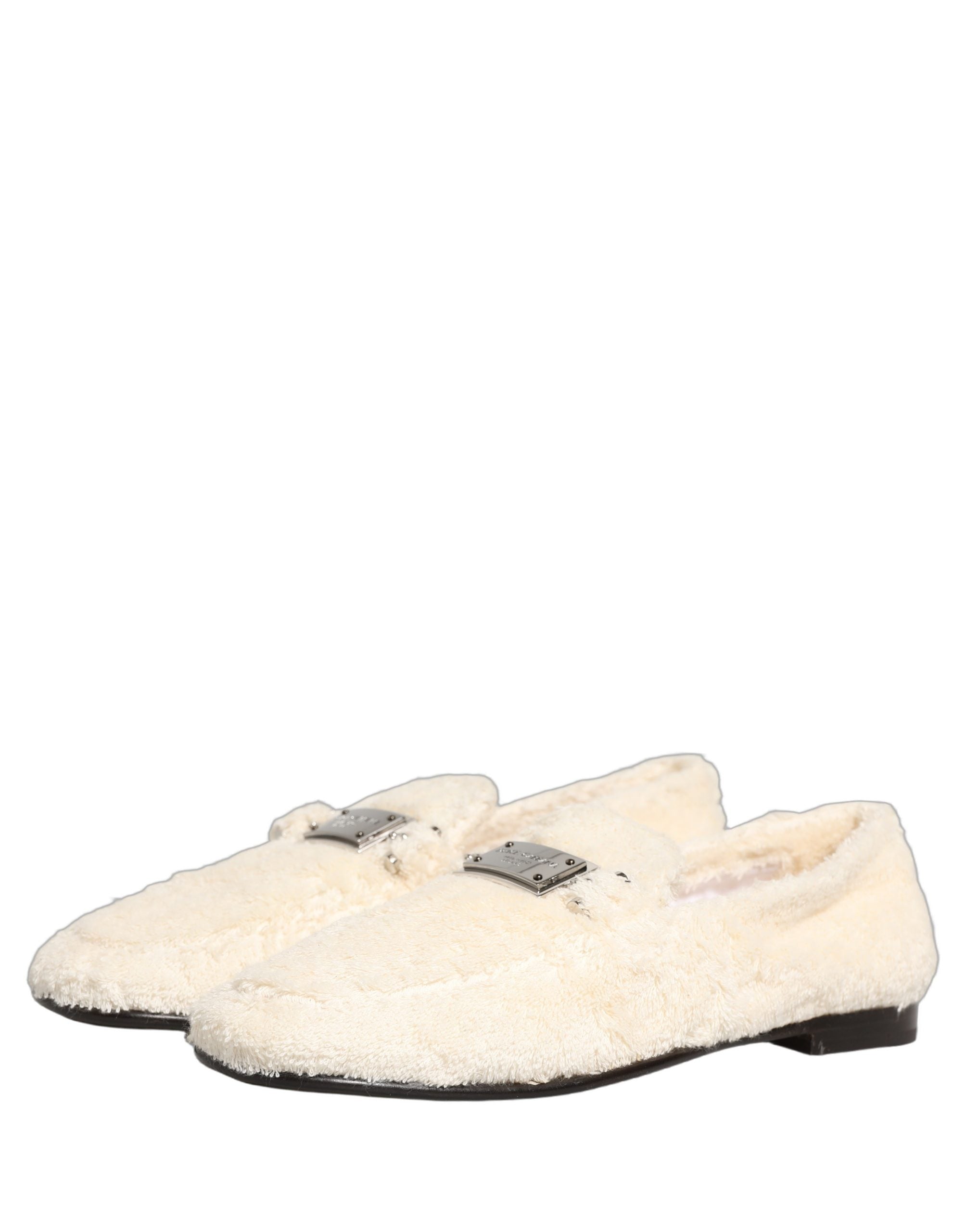 Chaussures loafers en shearling blanc Dolce & Gabbana pour homme, élégantes et confortables, en cuir et fourrure.