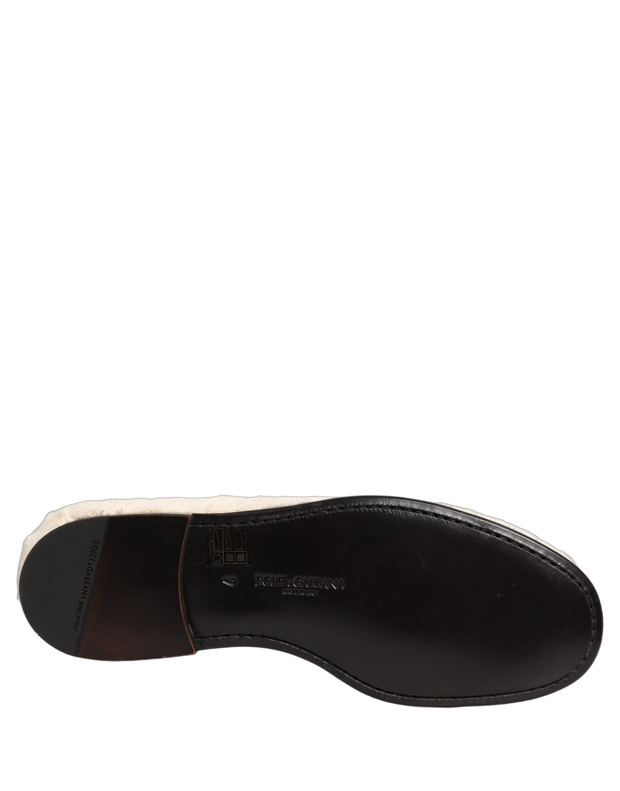 Chaussures mocassins pour homme Dolce & Gabbana en fourrure blanche et shearling, élégantes et confortables.