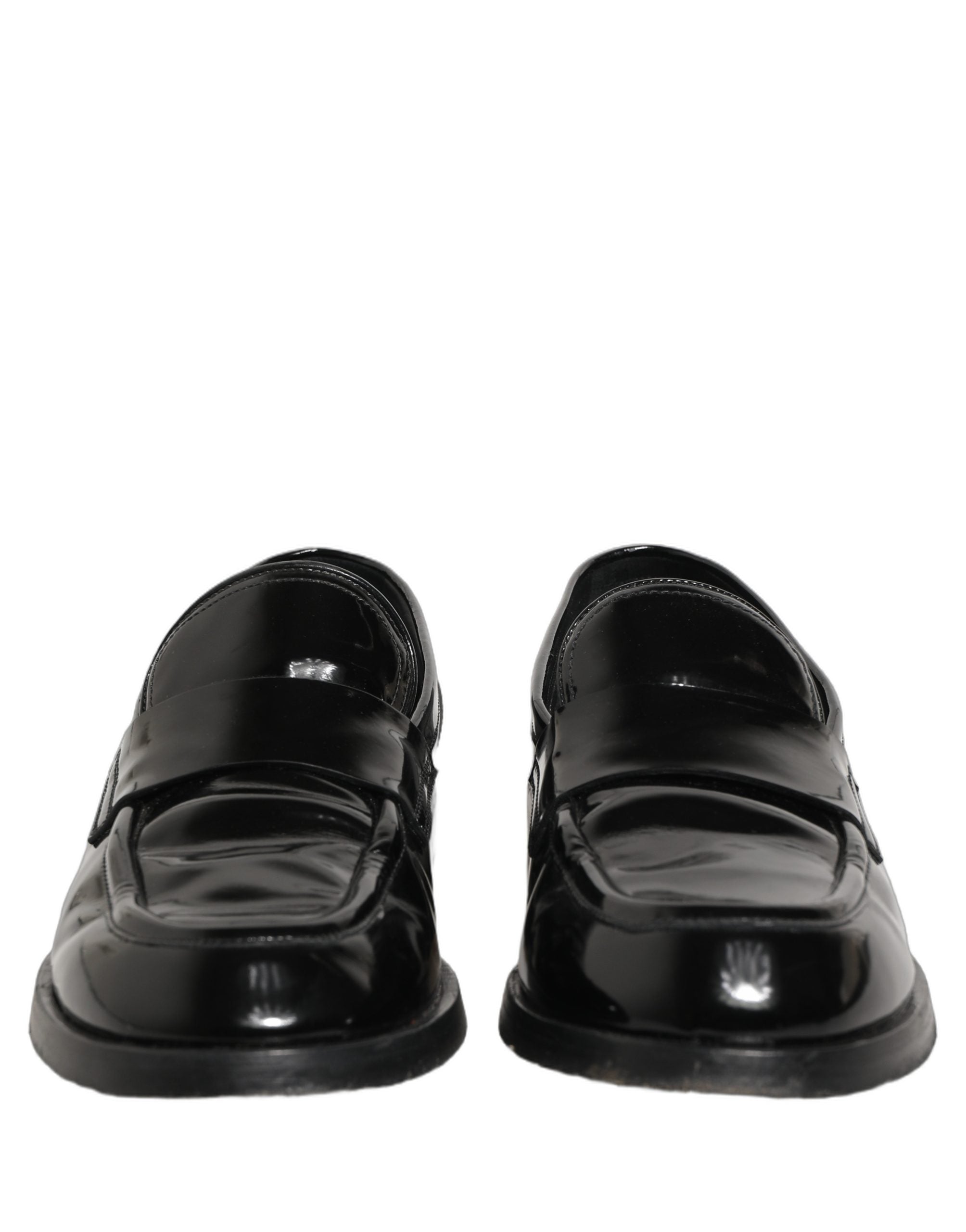 Chaussures mocassins formels en cuir noir Dolce & Gabbana pour homme, détails élégants et finition de qualité.