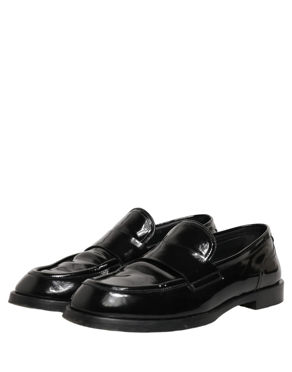 Chaussures mocassins formels en cuir noir Dolce & Gabbana pour hommes, élégantes et sophistiquées, visibles en gros plan.