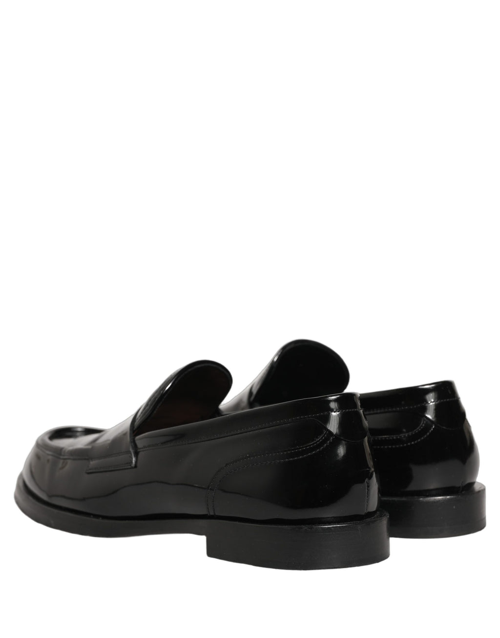 Chaussures mocassins habillées en cuir noir de Dolce & Gabbana pour homme, style formel et élégant.