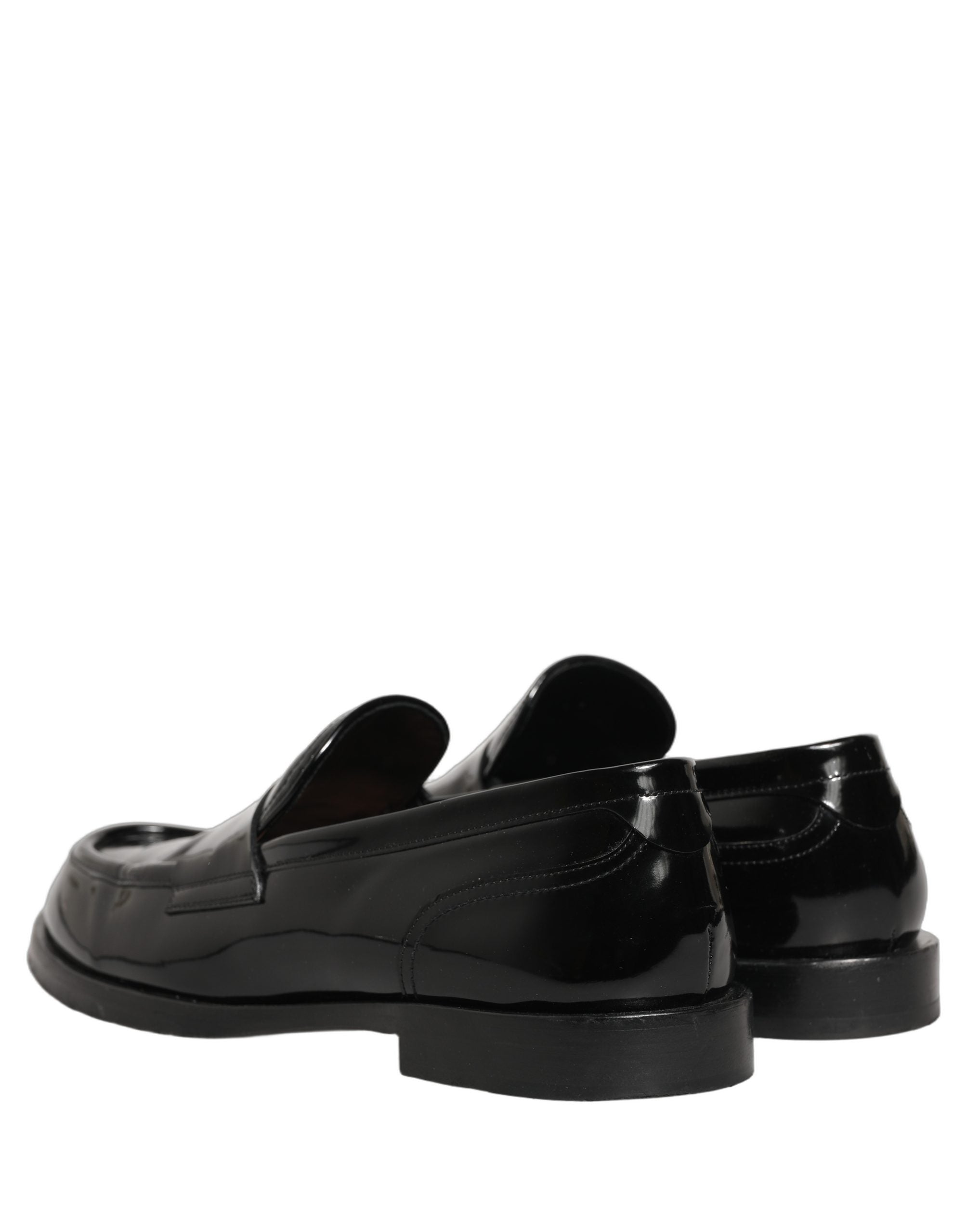 Chaussures mocassins habillées en cuir noir de Dolce & Gabbana pour homme, style formel et élégant.