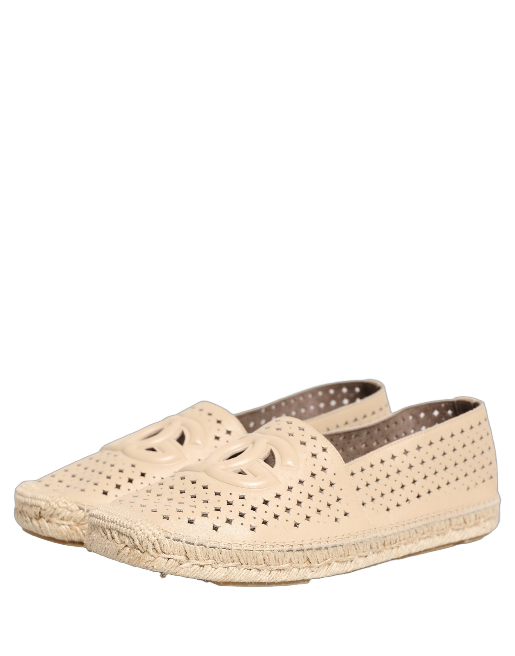 Espadrilles en cuir beige Dolce & Gabbana avec logo découpé, chaussures élégantes et confortables pour l'été.