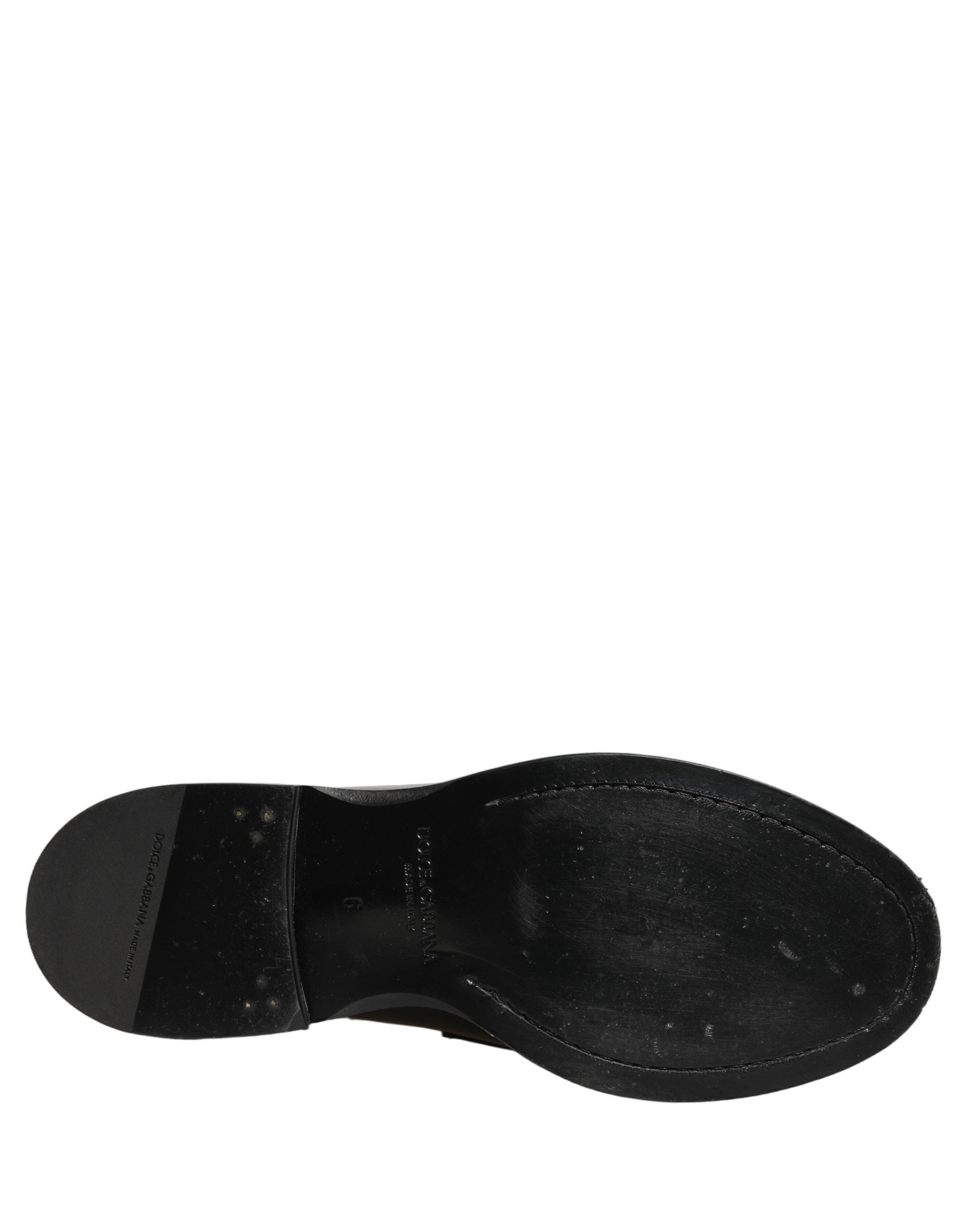 Chaussures mocassins formels en cuir noir de Dolce & Gabbana pour hommes, élégantes et sophistiquées.