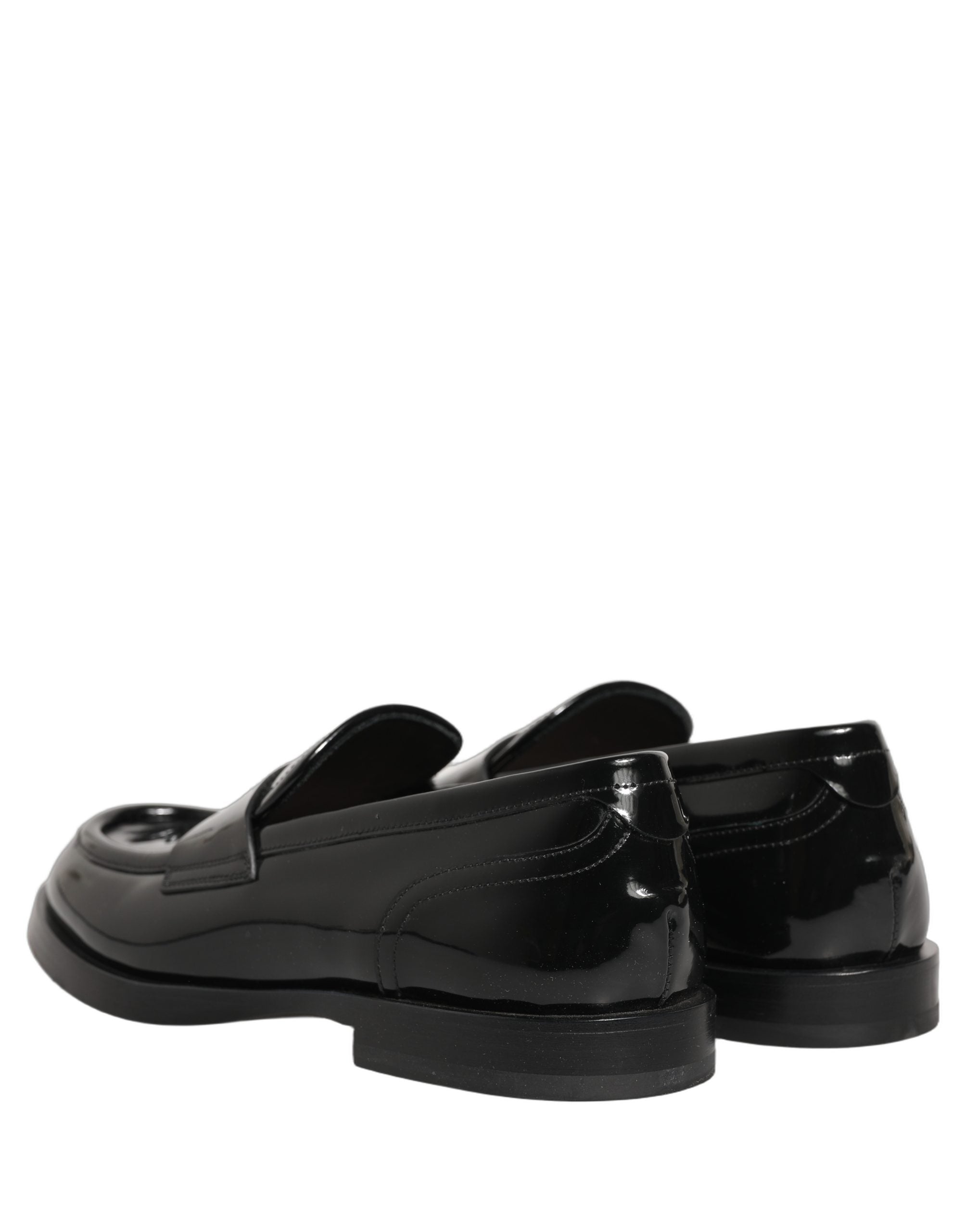 Chaussures Richelieu en cuir noir de luxe pour homme de Dolce & Gabbana, chaussures formelles élégantes et sophistiquées.