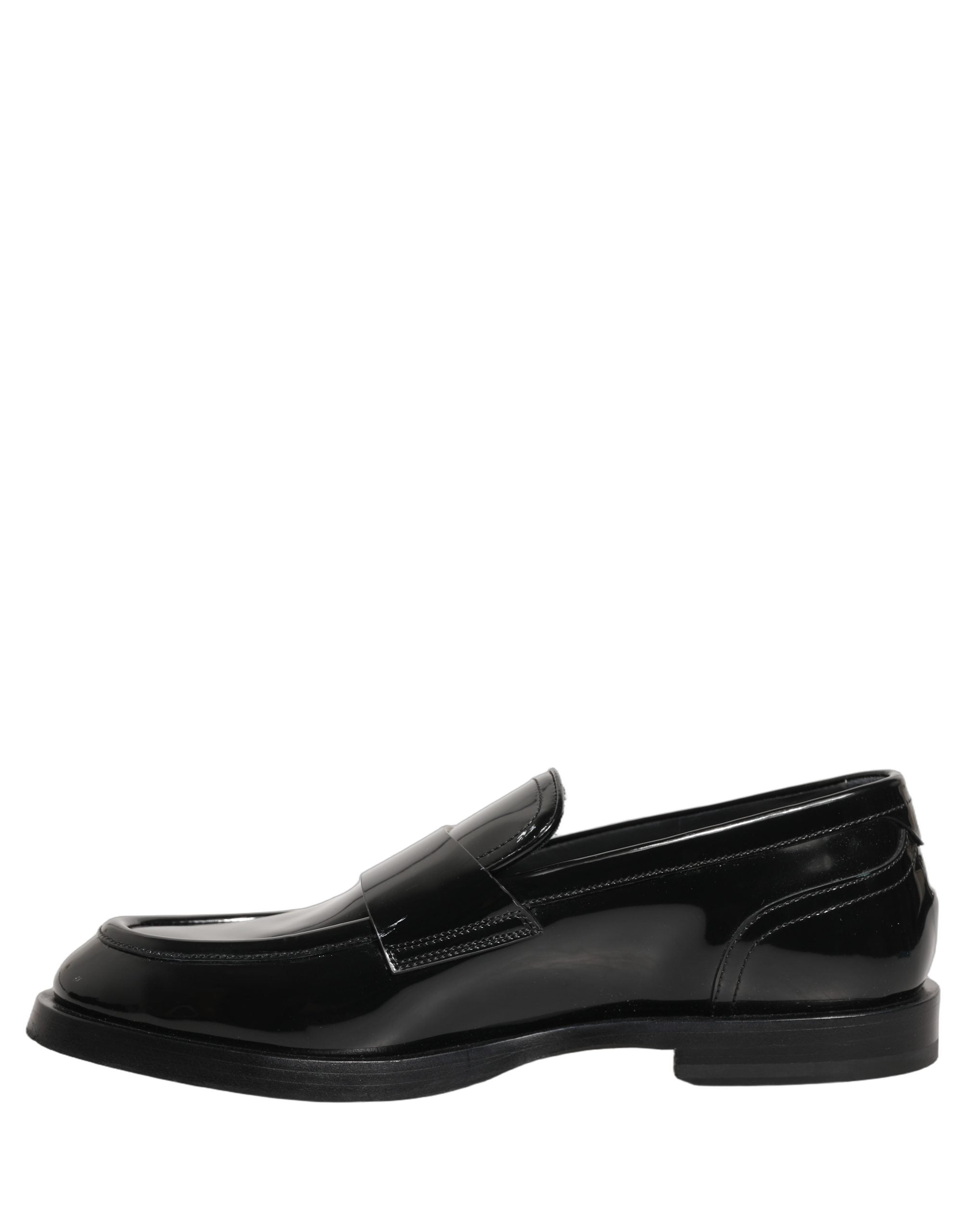 Chaussures mocassins formels en cuir noir Dolce & Gabbana pour hommes, design élégant et sophistiqué.