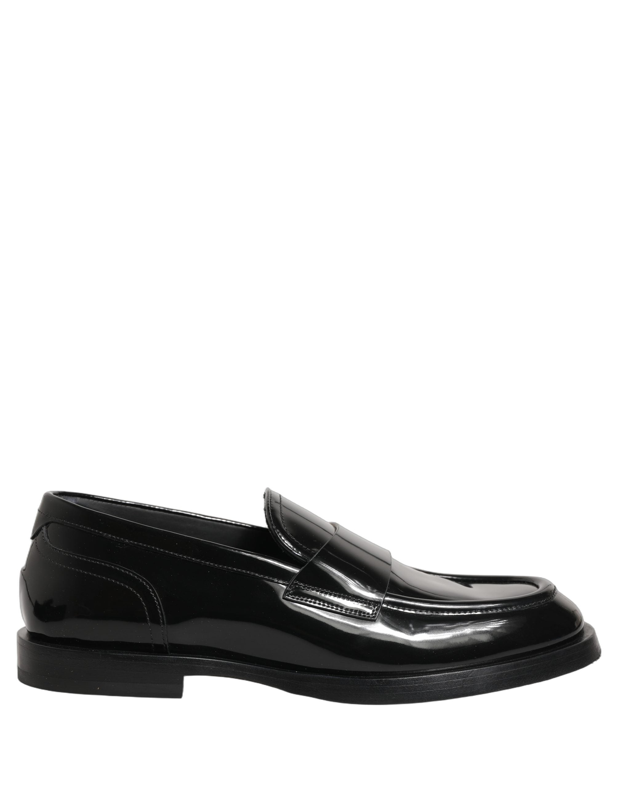 Chaussures formelles pour hommes Dolce & Gabbana en cuir noir, mocassins élégants et sophistiqués pour occasions spéciales.