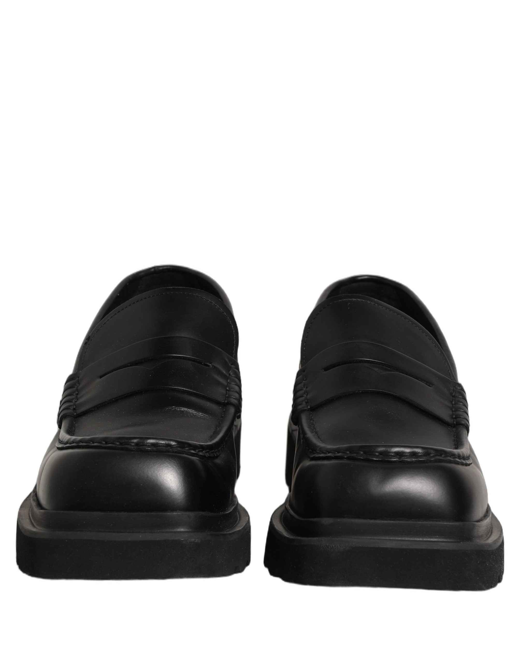 Chaussures mocassins pour homme Dolce & Gabbana en cuir de veau noir, élégantes et classiques pour dressing formel.