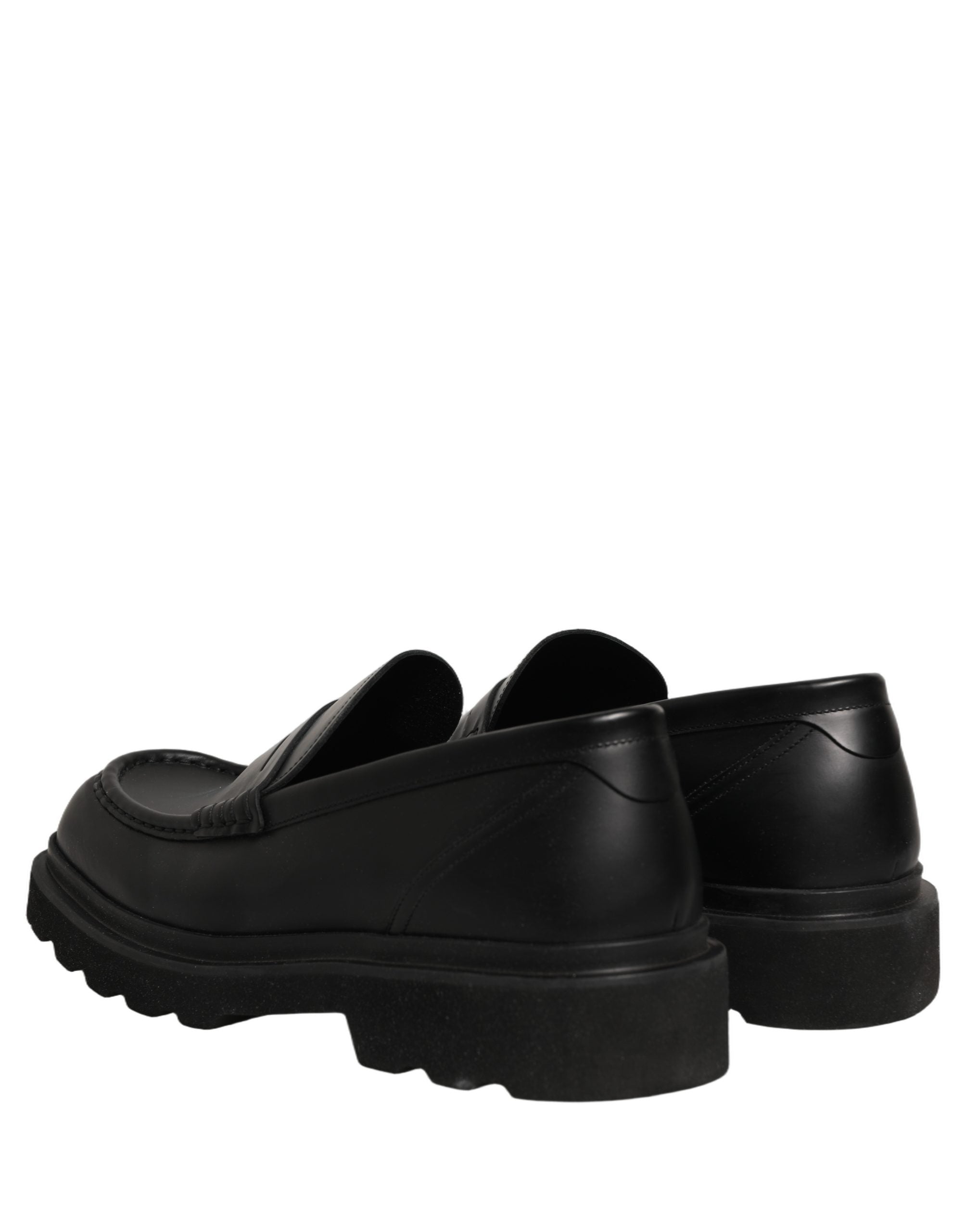Chaussures mocassins pour homme Dolce & Gabbana en cuir de veau noir, élégantes et sophistiquées.