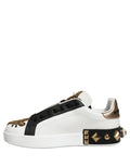 Chaussures sneakers Portofino blanches en or orné de studs, de la marque Dolce & Gabbana, vue de face.
