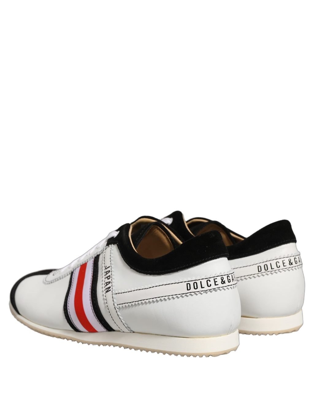 Chaussures sneakers basses Dolce & Gabbana en cuir noir et blanc avec détails en daim, style moderne et tendance.
