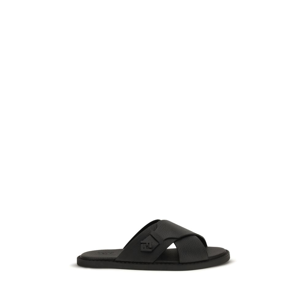 Sandales plates Fendi en cuir de veau noir Bos Taurus, élégantes et confortables, avec finition soignée.