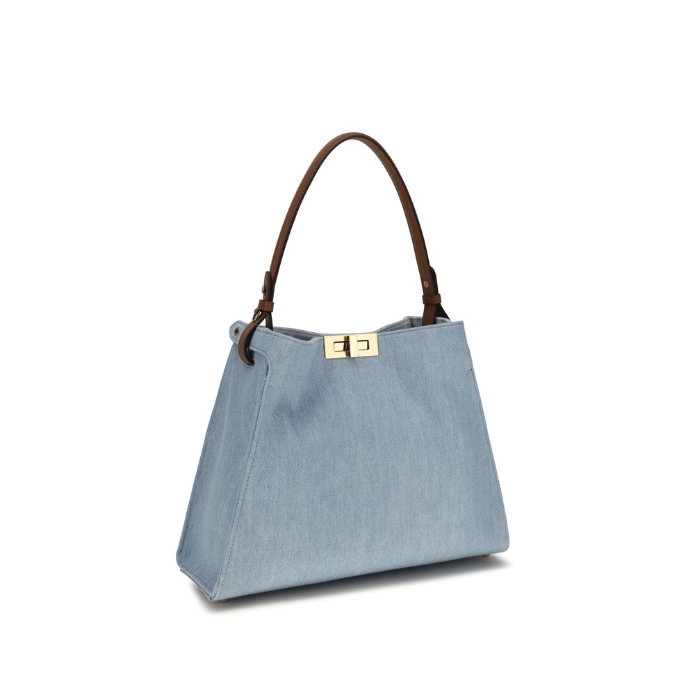 Sac à main en coton bleu de Fendi, élégant et tendance, avec détails de maroquinerie de luxe.