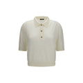 Chemise polo blanche en laine Balmain Oves Aries avec col classique et logo brodé, portée sur un mannequin.