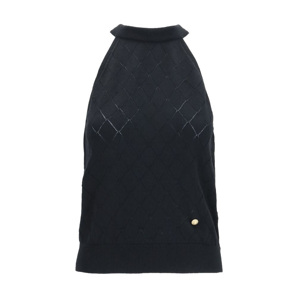 T-shirt sans manches Balmain en laine noire avec motif Aries, style élégant et moderne, visible avec détails de la marque.