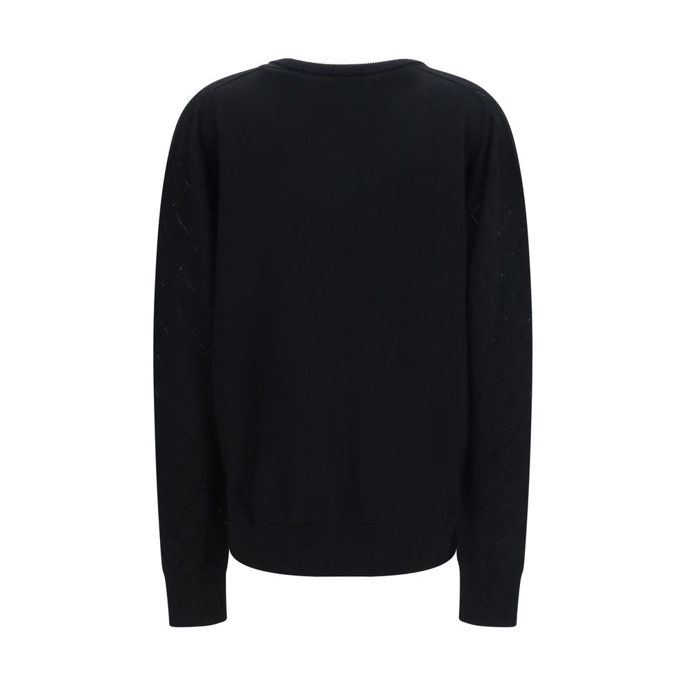 Sweat-shirt noir en laine Balmain Oves Aries avec logo brodé, col rond et coupe décontractée, porté sur un mannequin.