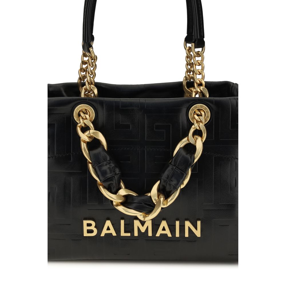 Sac à bandoulière Balmain Bos Taurus en cuir de veau noir, élégant et sophistiqué, avec détails raffinés.