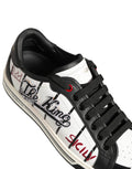 Chaussures basses Dolce & Gabbana logo DG en blanc et noir avec patch King, style sneaker décontracté.