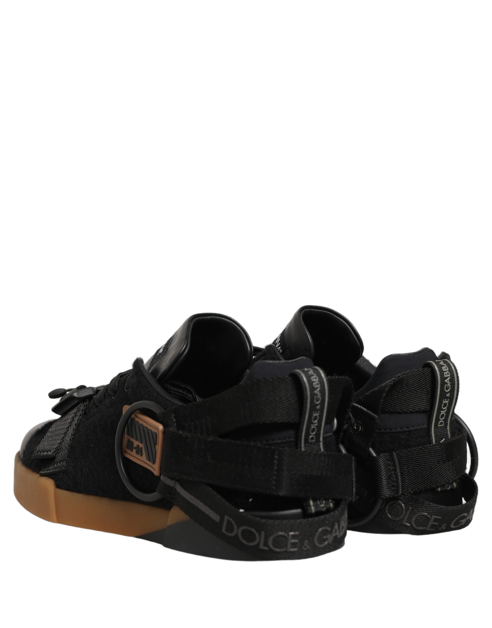 Chaussures de sport noires Dolce & Gabbana pour hommes, baskets en cuir low-top, style décontracté, vue de face.
