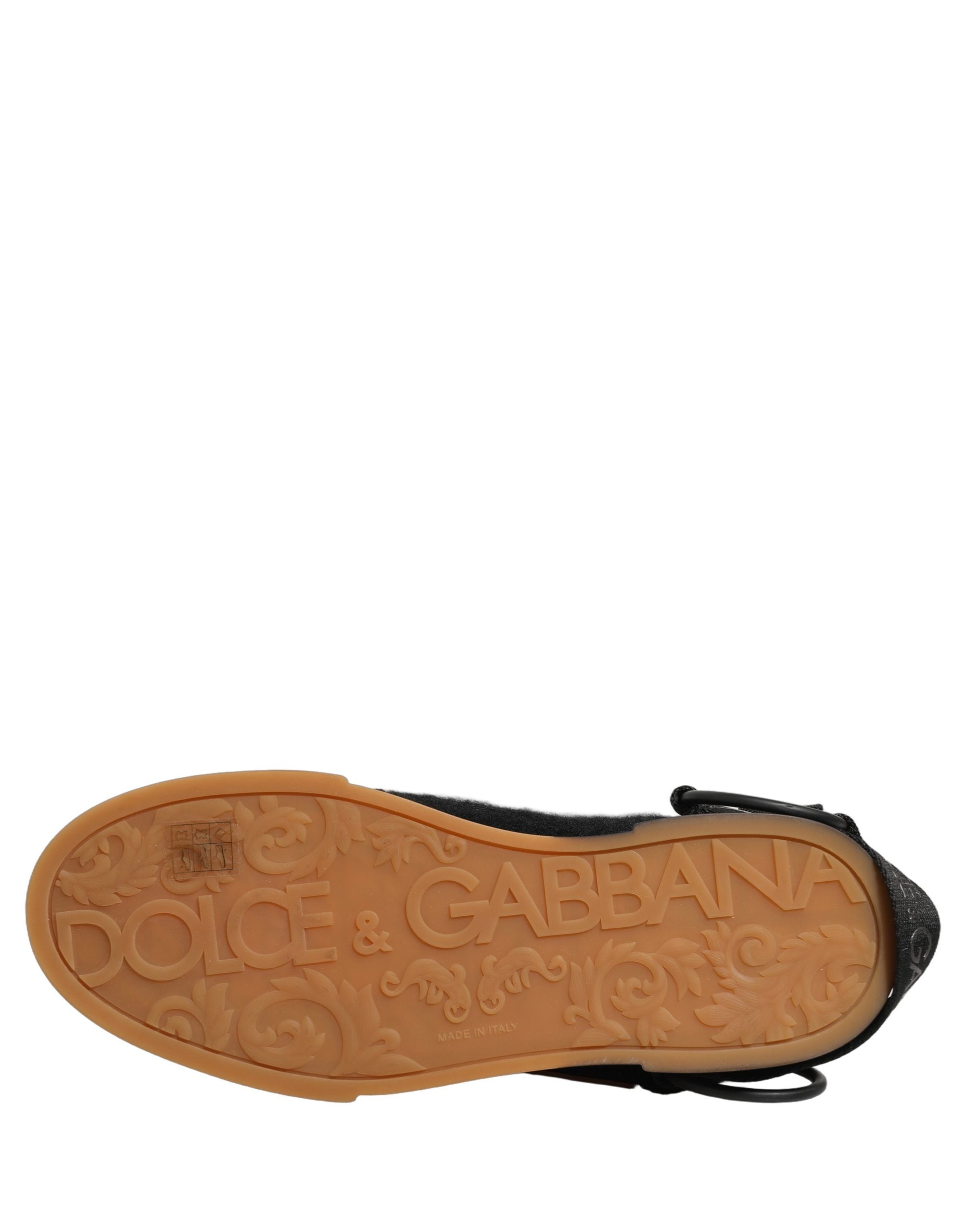 Chaussures de sneakers basses en cuir noir Dolce & Gabbana pour homme, style décontracté et moderne.