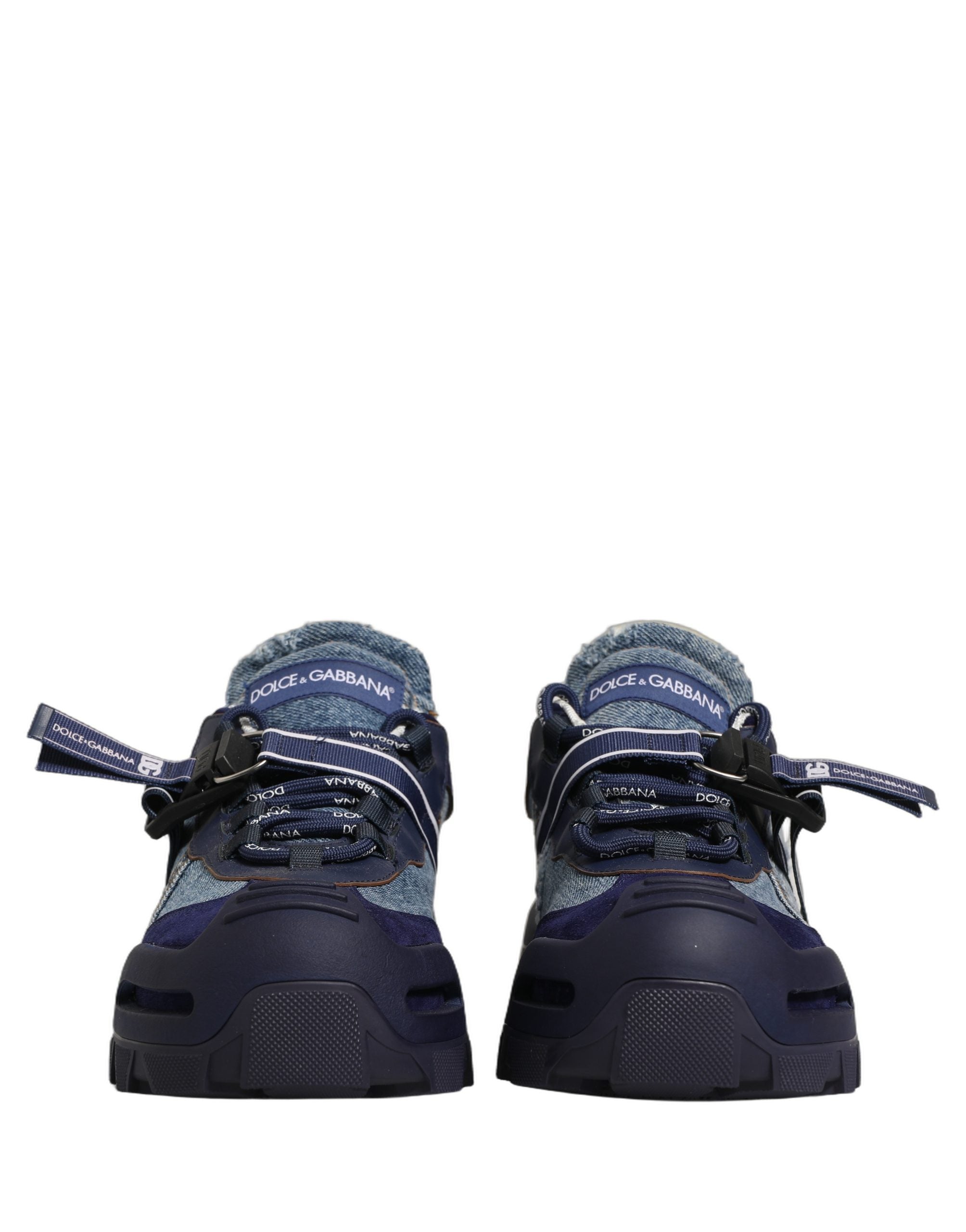 Baskets basses en denim bleu Dolce & Gabbana Airmaster Panelled Low Top avec détails en cuir et semelle blanche.