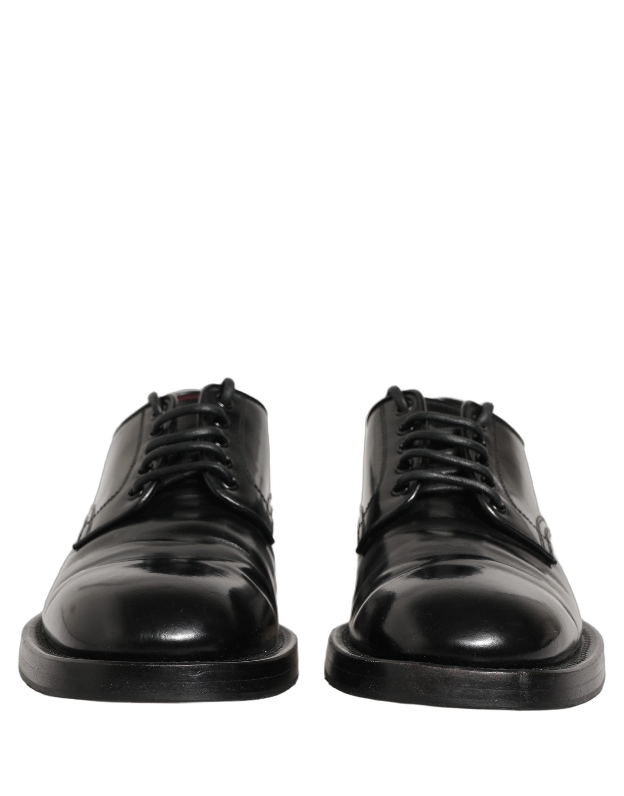 Chaussures Derby pour homme Dolce & Gabbana en cuir noir avec lacets, élégantes et sophistiquées.