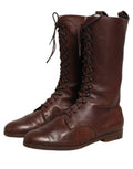 Bottes en cuir marron Dolce & Gabbana, à lacets, mi-mollet, élégantes et sophistiquées pour femme.