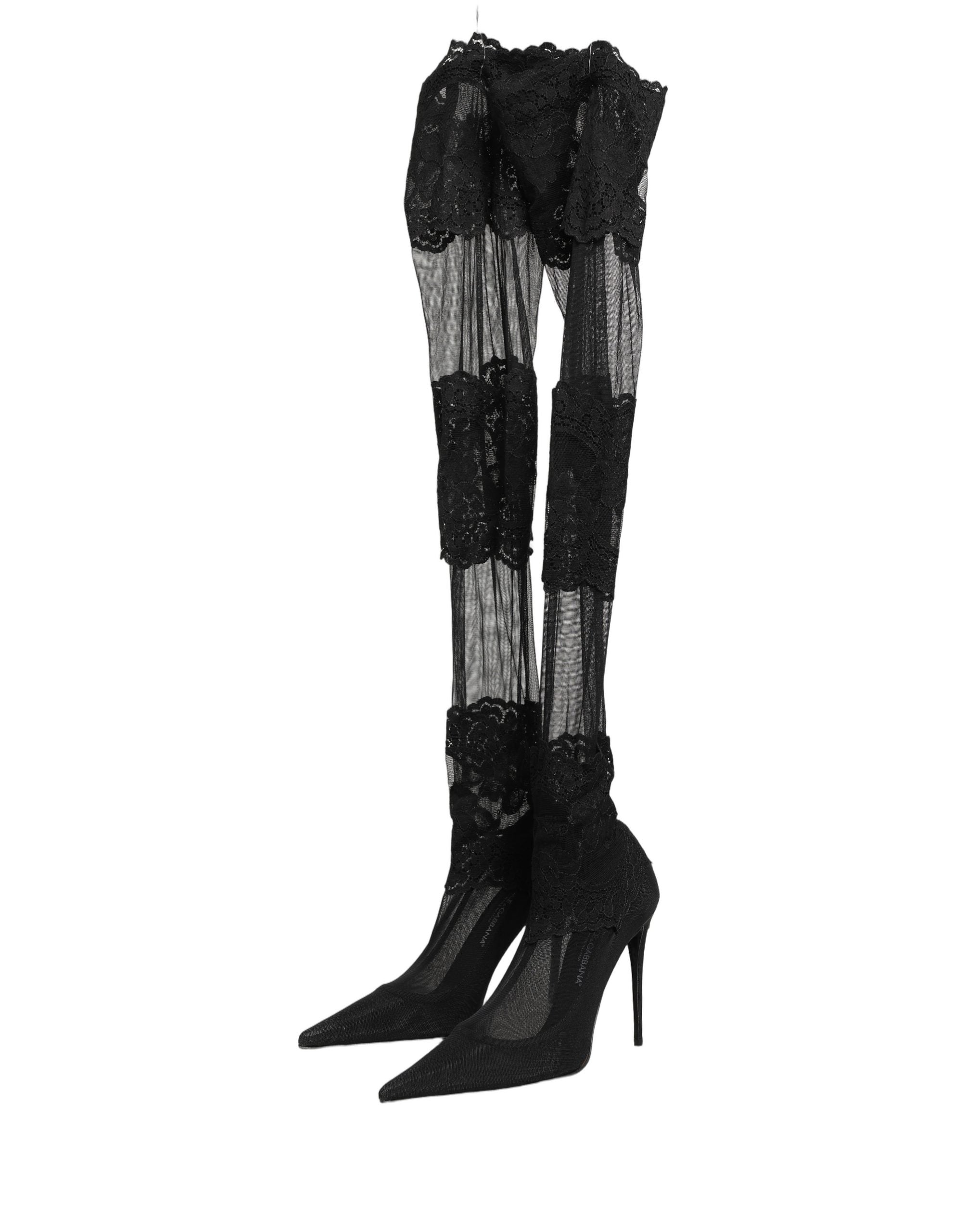 Chaussures Dolce & Gabbana à talons, bottines noires à over-the-knee, style élégant et sophistiqué, en cuir noir.