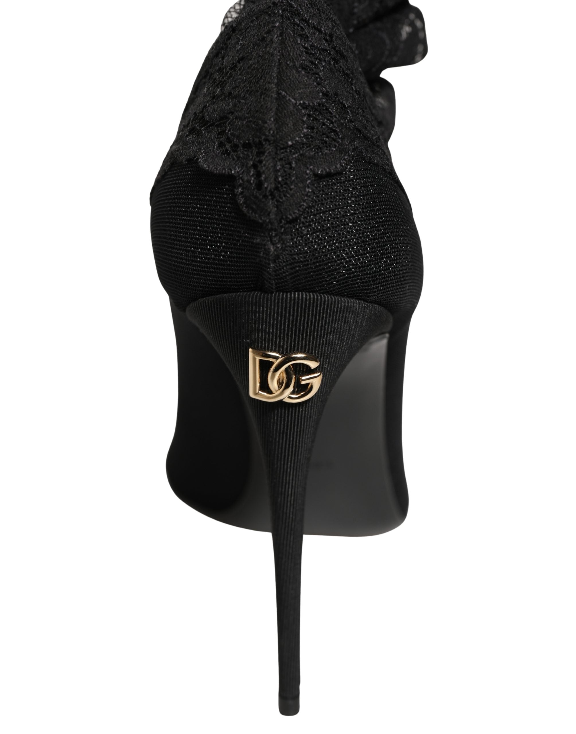 Bottes noires Dolce & Gabbana, cuissardes avec talons, en cuir, avec semelle épaisse et design élégant.