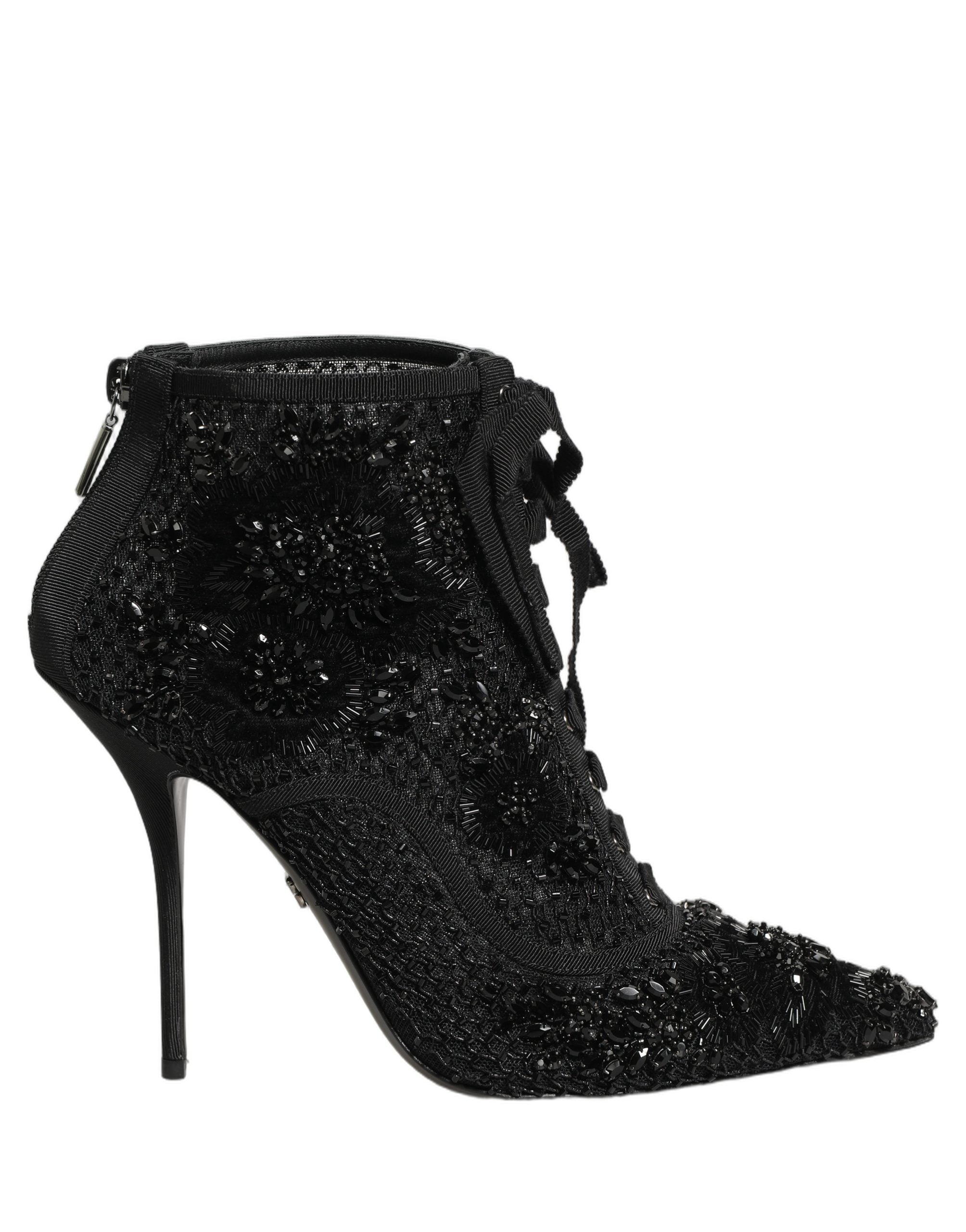 Bottes ankle en mesh noir Dolce & Gabbana avec embellissements, semelle en cuir et design élégant et sophistiqué.