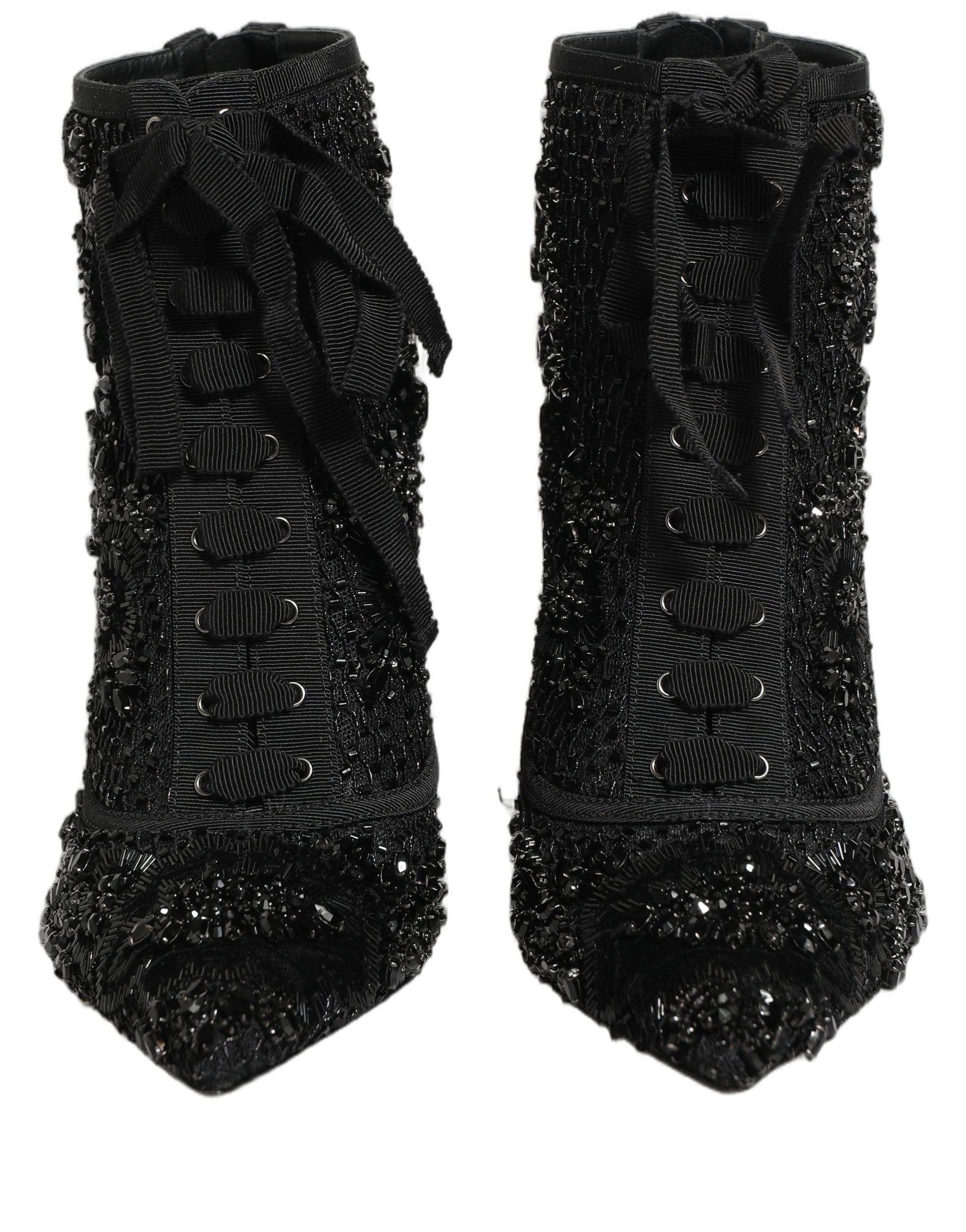 Bottes ankle en mesh noir Dolce & Gabbana ornées de détails brillants, élégantes chaussures à talons pour femmes.