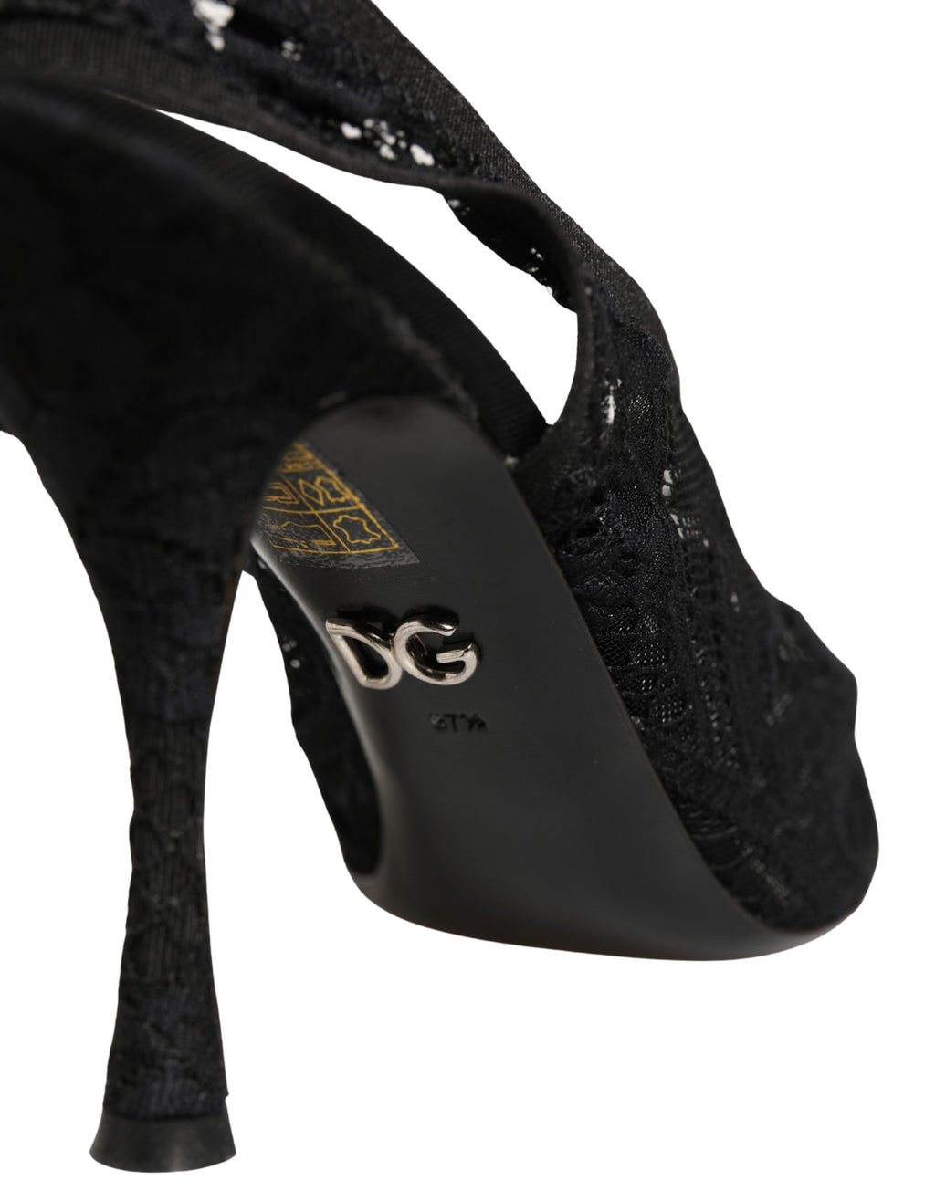 Chaussures Dolce & Gabbana en dentelle noire, escarpins à talon pointu et bride arrière, élégantes et sophistiquées.