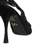 Chaussures Dolce & Gabbana en dentelle noire, escarpins à talon pointu et bride arrière, élégantes et sophistiquées.