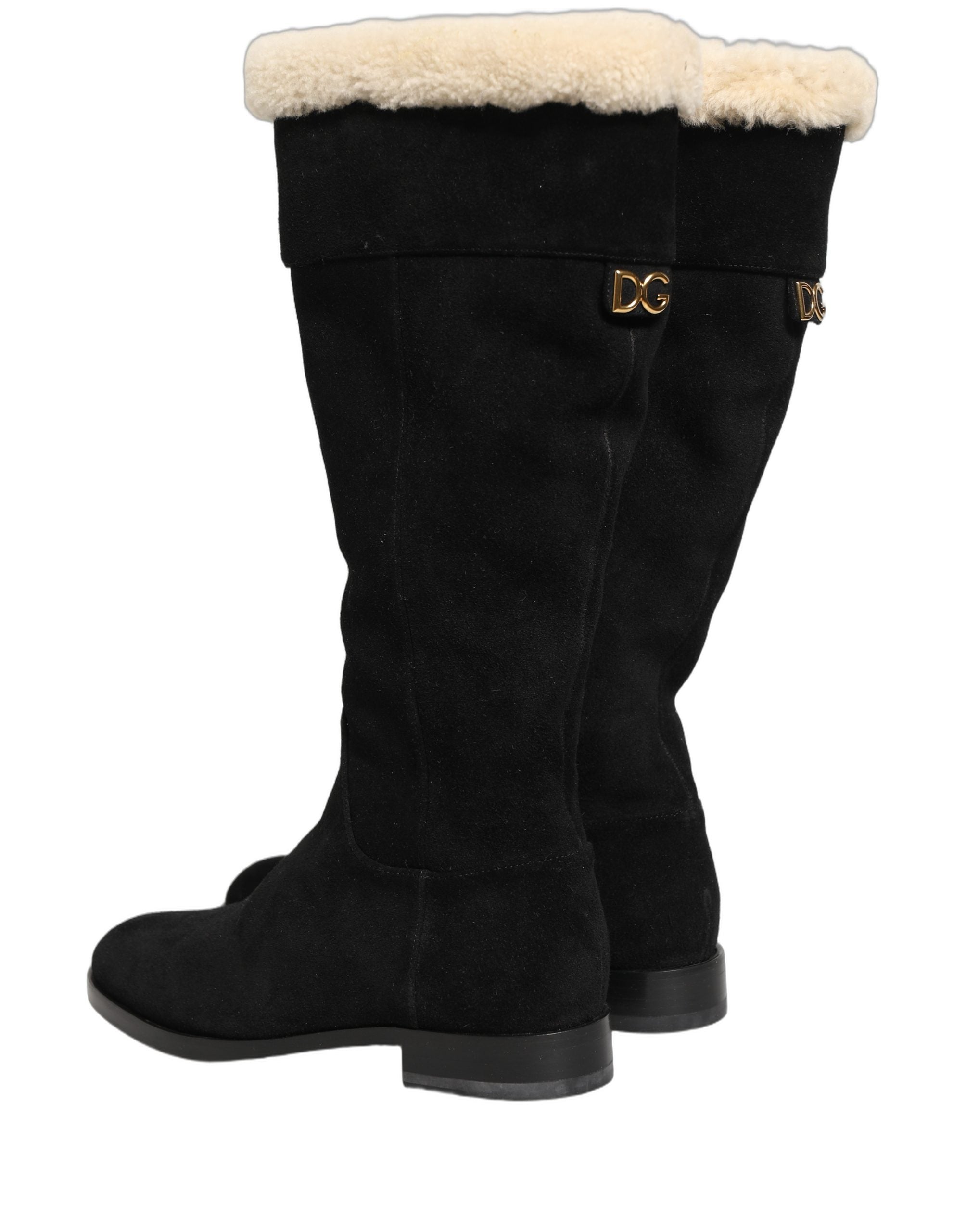 Bottes en cuir suede noir Dolce & Gabbana, à hauteur du genou, avec talons et design élégant.