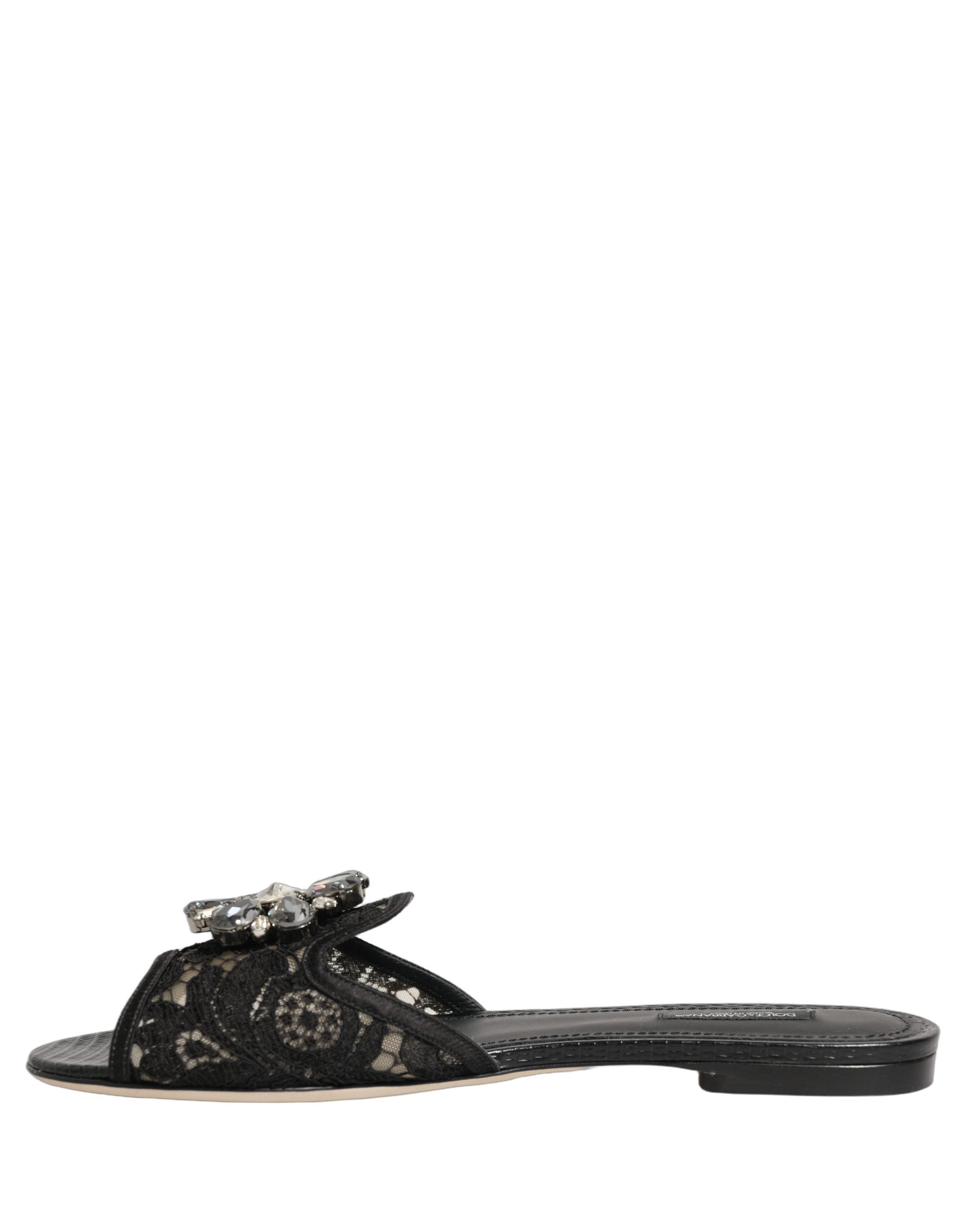Chaussures plates Dolce & Gabbana Devotion en dentelle noire, slip-on élégantes et confortables pour femmes.