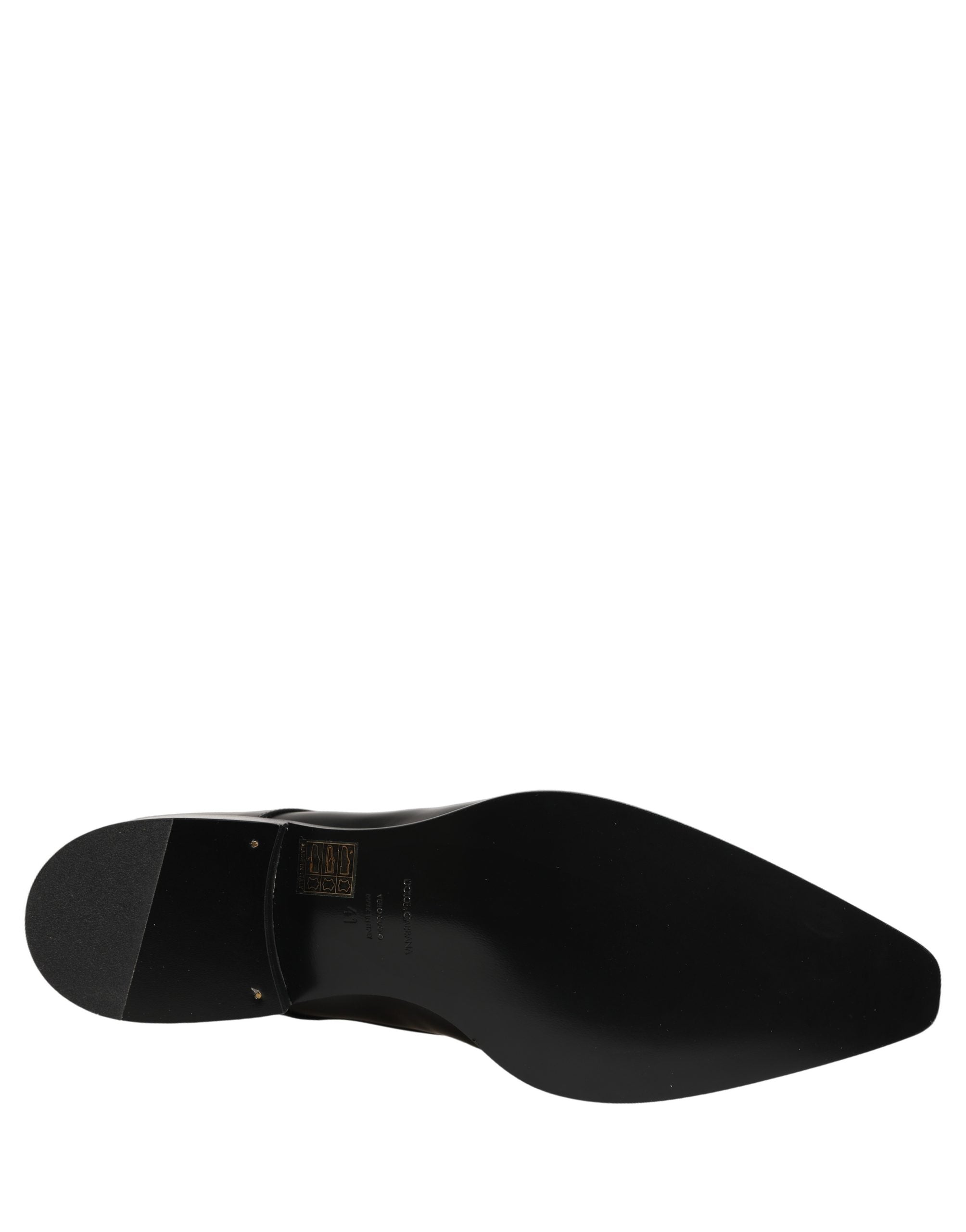 Chaussures derby en cuir noir Dolce & Gabbana avec lacets, style élégant et sophistiqué, pour homme.