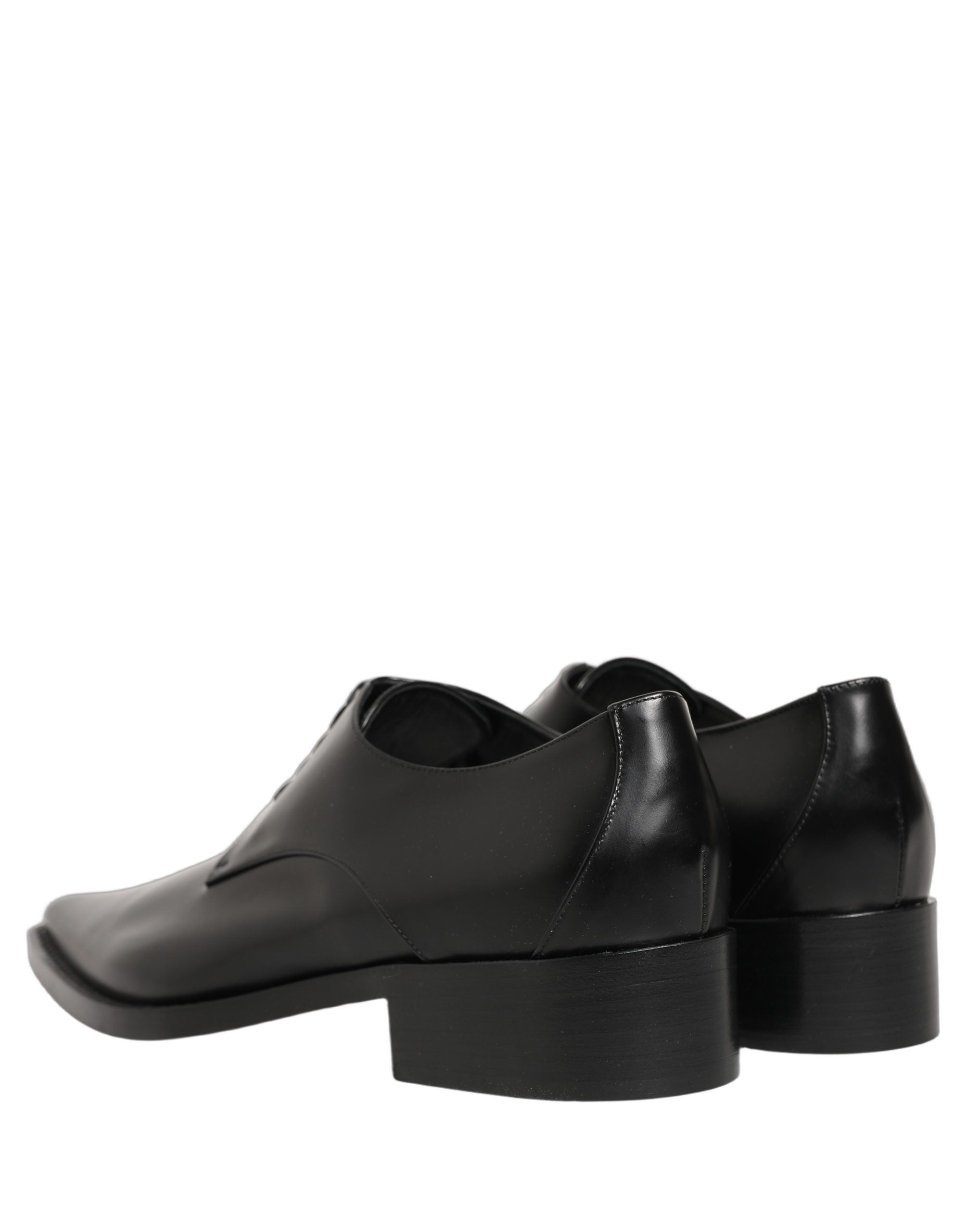Chaussures derby en cuir noir Dolce & Gabbana avec lacets, élégantes et sophistiquées pour homme.