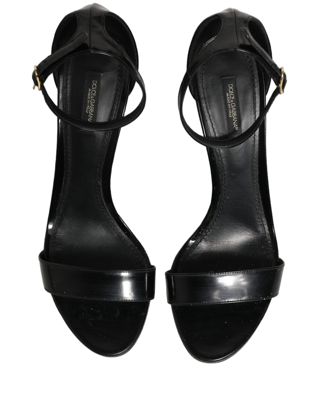 Sandales à talons noires Dolce & Gabbana en cuir avec bride à la cheville, vue de côté sur une paire élégante.