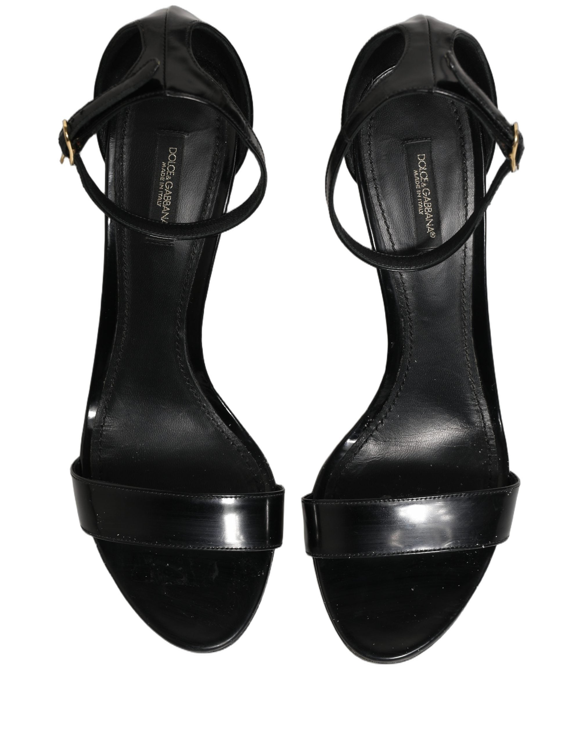 Sandales à talons noires Dolce & Gabbana en cuir avec bride à la cheville, vue de côté sur une paire élégante.