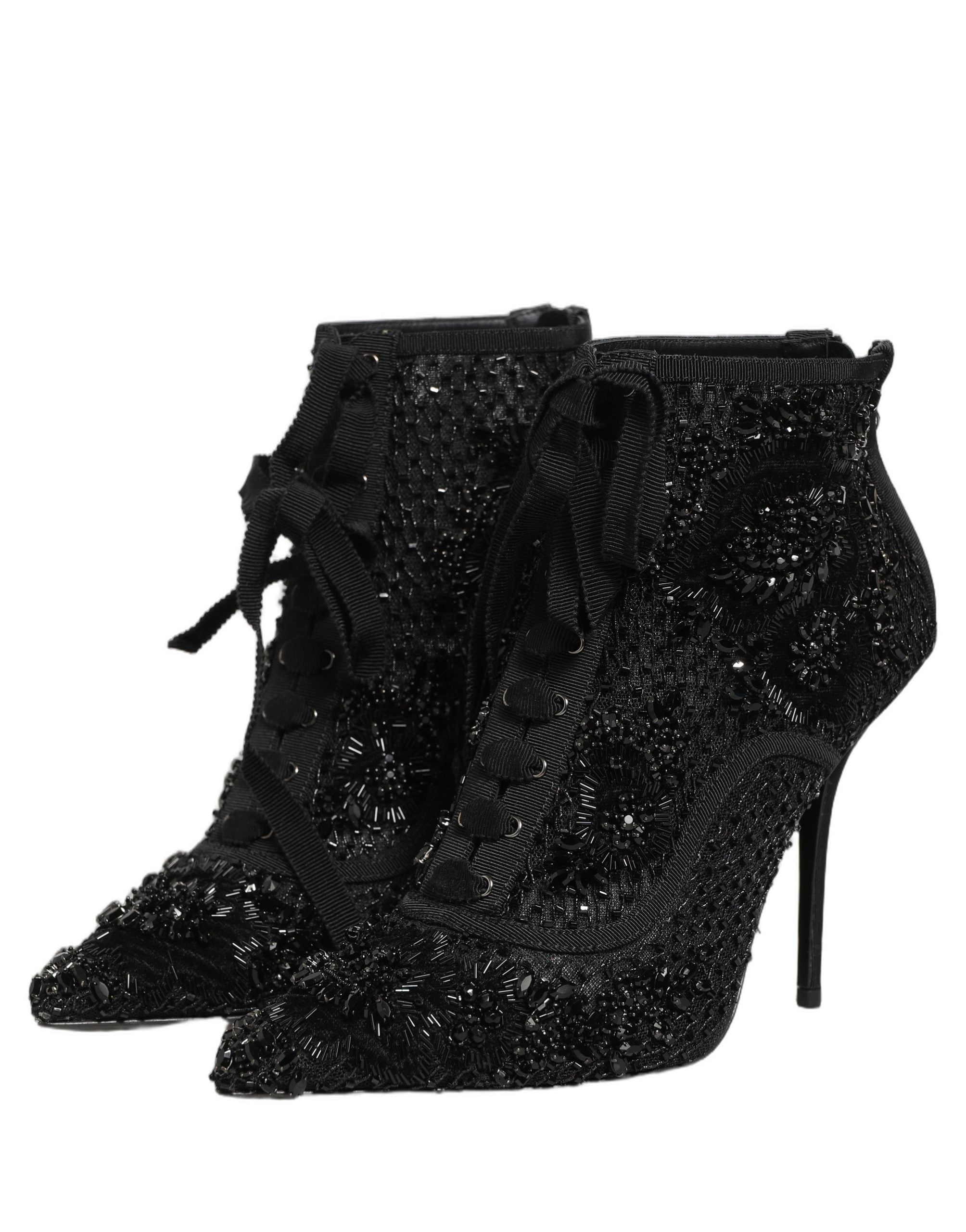 Bottes à talons ankle en mesh noir Dolce & Gabbana avec embellissements, élégantes et sophistiquées, vues de côté.