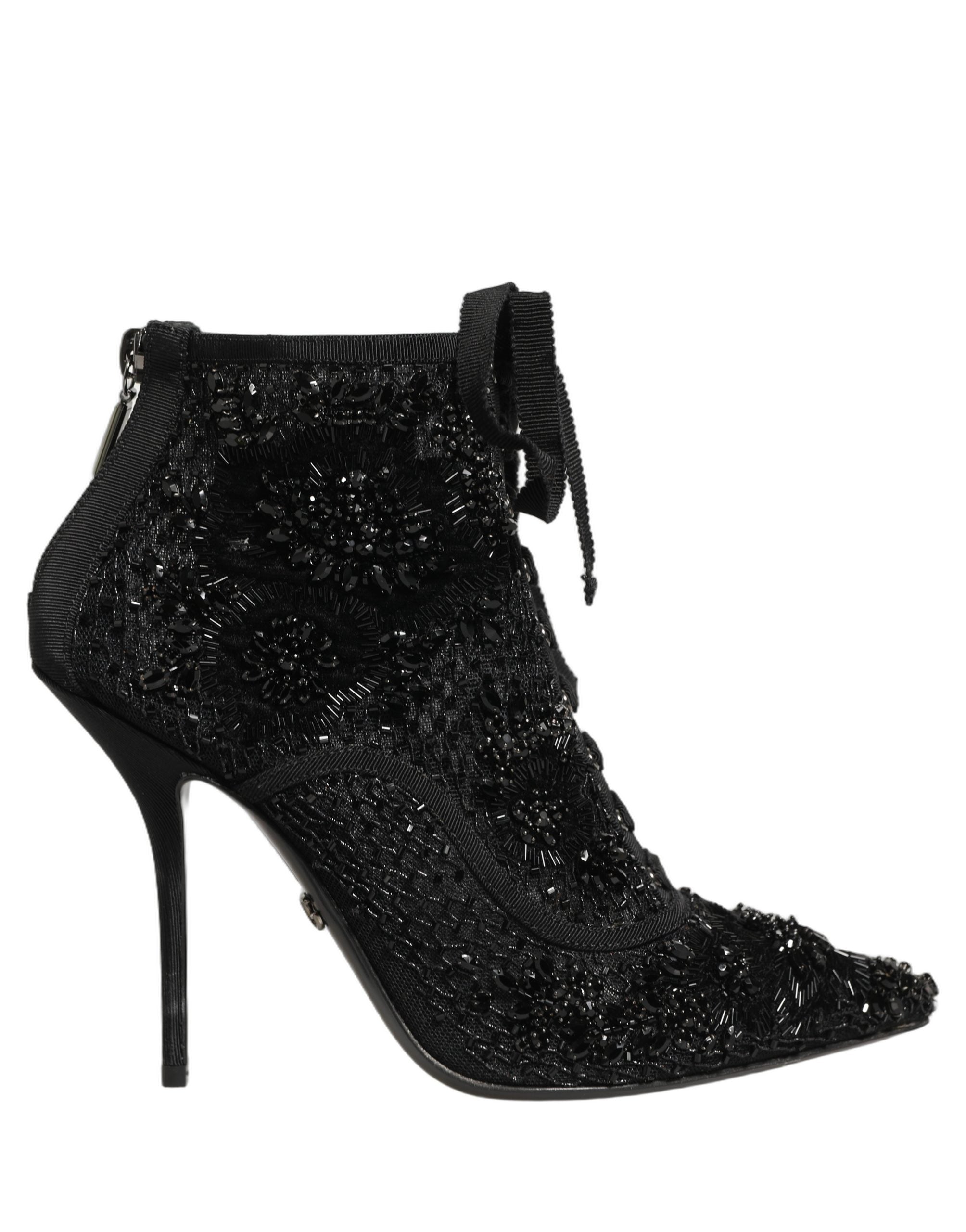 Bottes à talons mi-hauts Dolce & Gabbana en mesh noir ornées de broderies et embellissements, vue de côté.