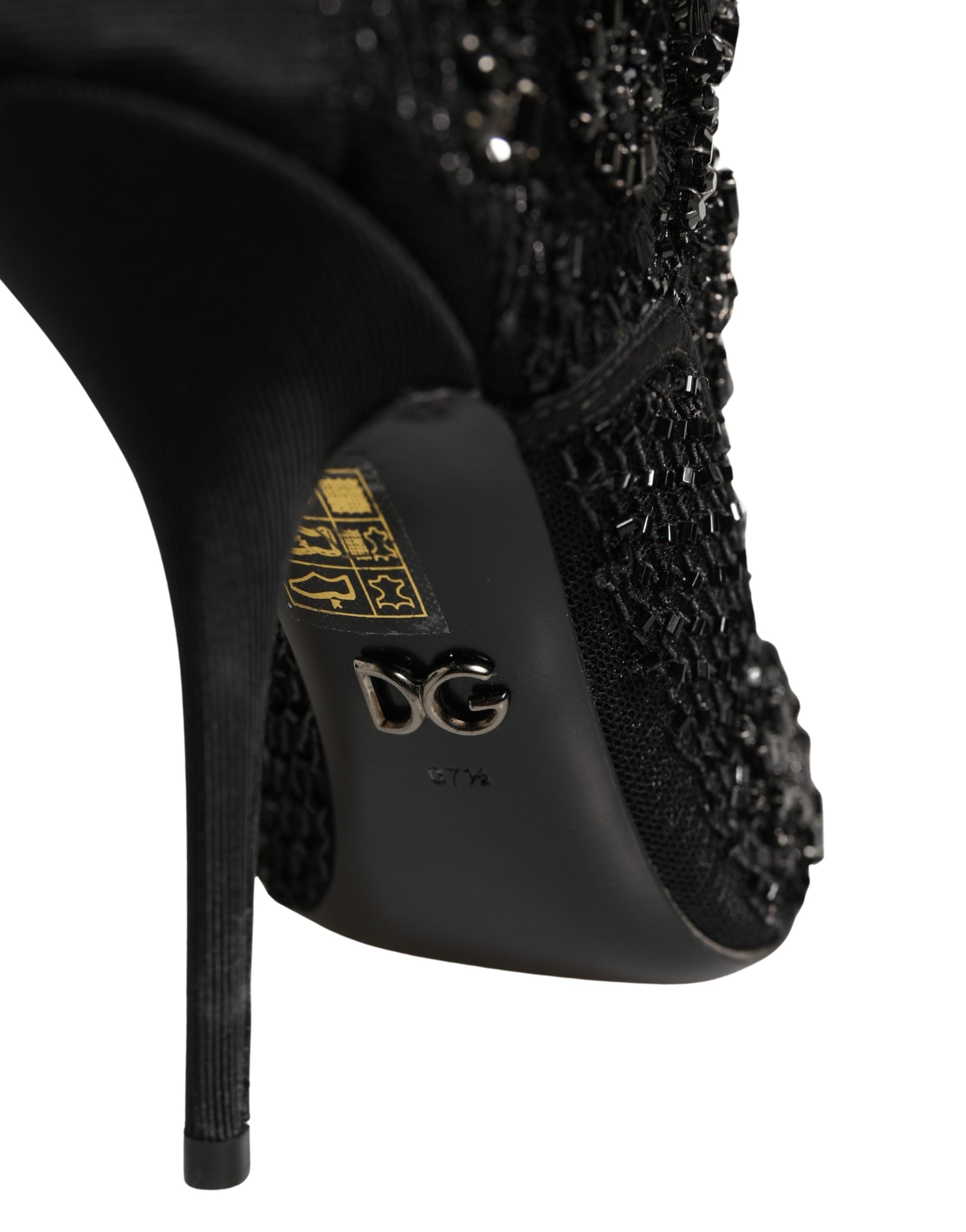 Bottes à cheville en mesh noir Dolce & Gabbana avec embellissements élégants et détails raffinés.